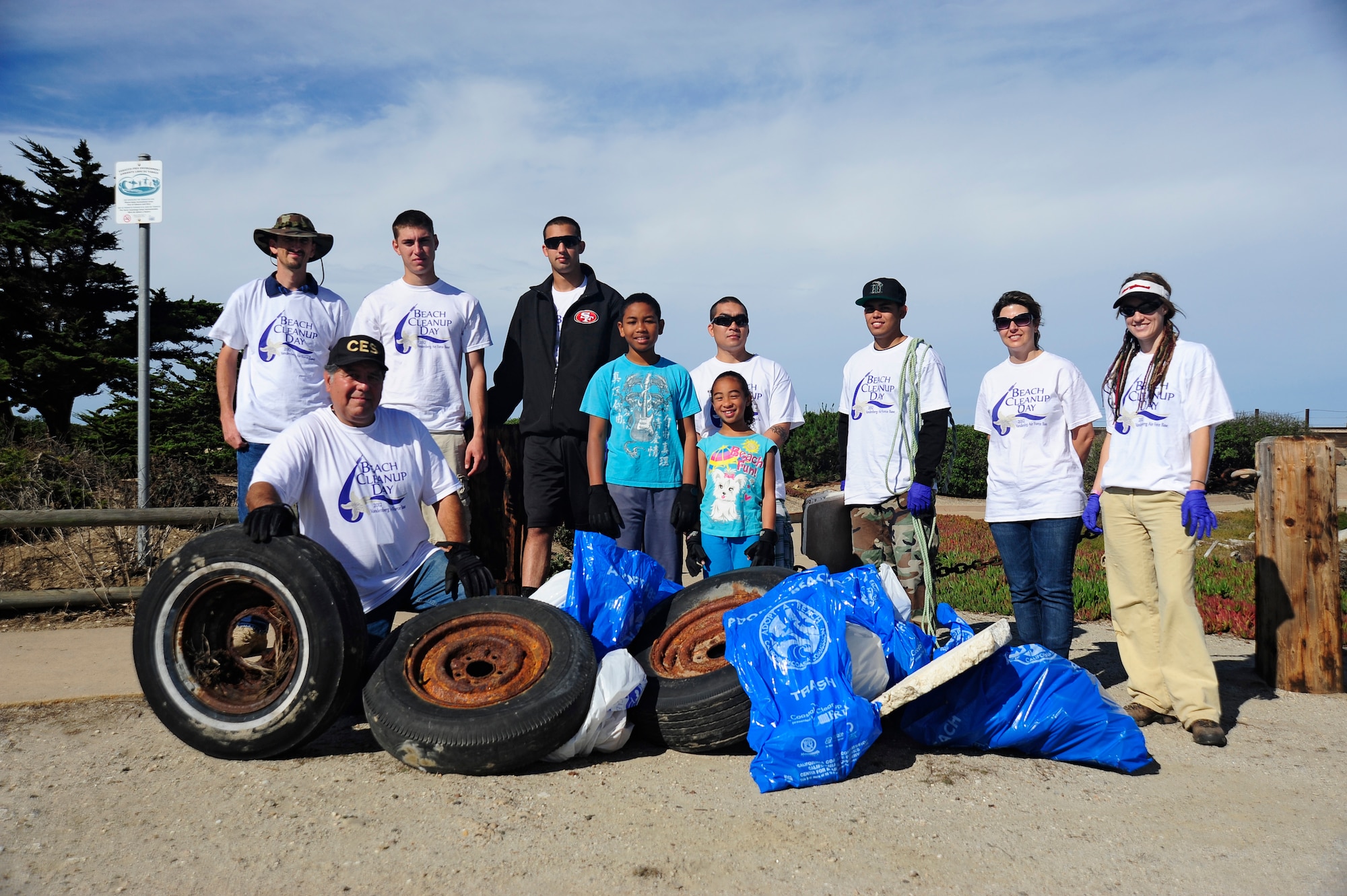 VANDENBERG AIR FORCE BASE, Calif. -- Volunteers from Vandenberg display their haul of trash and recyclables picked-up during an organized beach cleanup effort at Ocean Park Thursday, Nov. 1, 2012. (U.S. Air Force Photo/Michael Peterson)