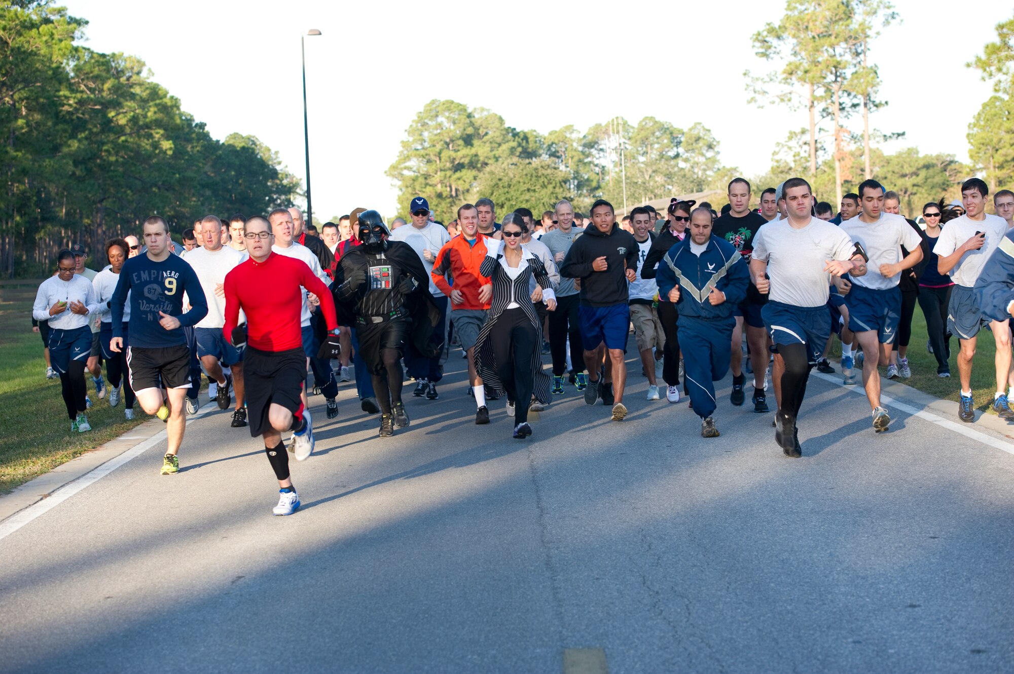 Participants of the Combined Federal Campaign Annual 5k Fun Run begin running on Hurlburt Field, Fla., Oct. 31, 2012.  CFC is one of the world’s largest annual workplace charity campaigns with more than 200 CFC campaigns throughout the country and internationally to help to raise millions of dollars each year. (U.S. Air Force Photo/Airman 1st Class Naomi M. Griego)