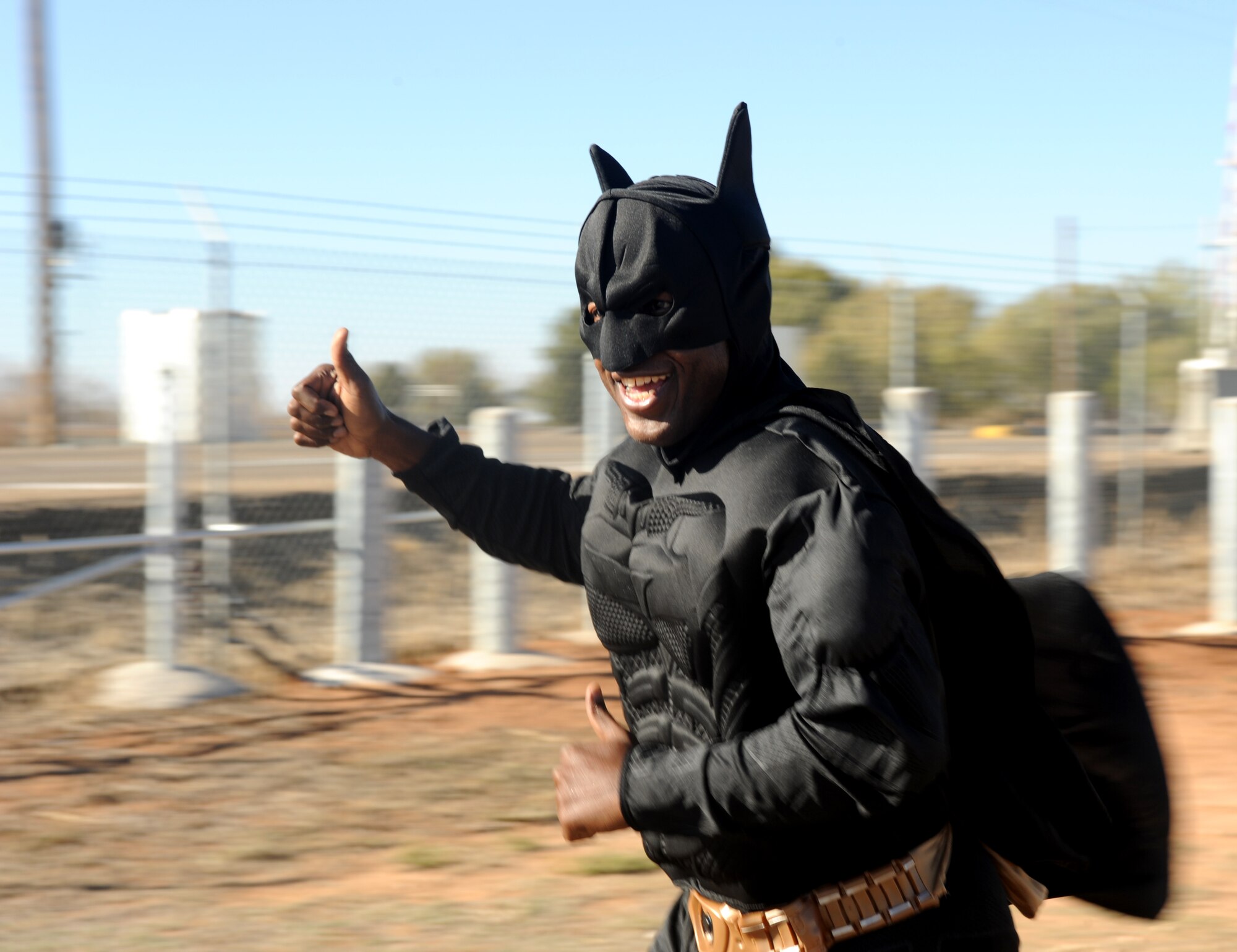Drake Davidson, Clovis, New Mexico resident, runs as Batman during the Spooky 5K at Cannon Air Force Base, N.M., Oct. 31, 2012. The 27th Special Operations Force Support Squadron hosted the event, which was open to Airmen as well as dependents. (U.S. Air Force photo/Airman 1st Class Xavier Lockley)