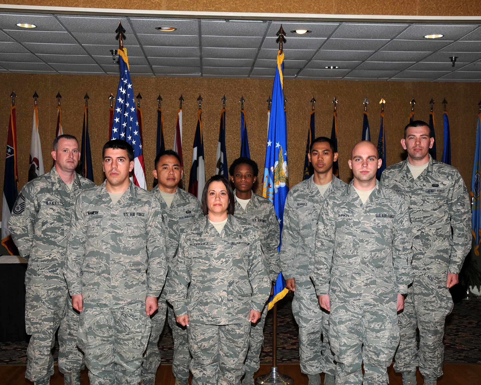 Eight of Team BLAZE’s newly promoted enlisted Airmen were promoted at the enlisted promotions ceremony at the Columbus Club on Oct. 31. (U.S. Air Force photo/Sharon Ybarra)