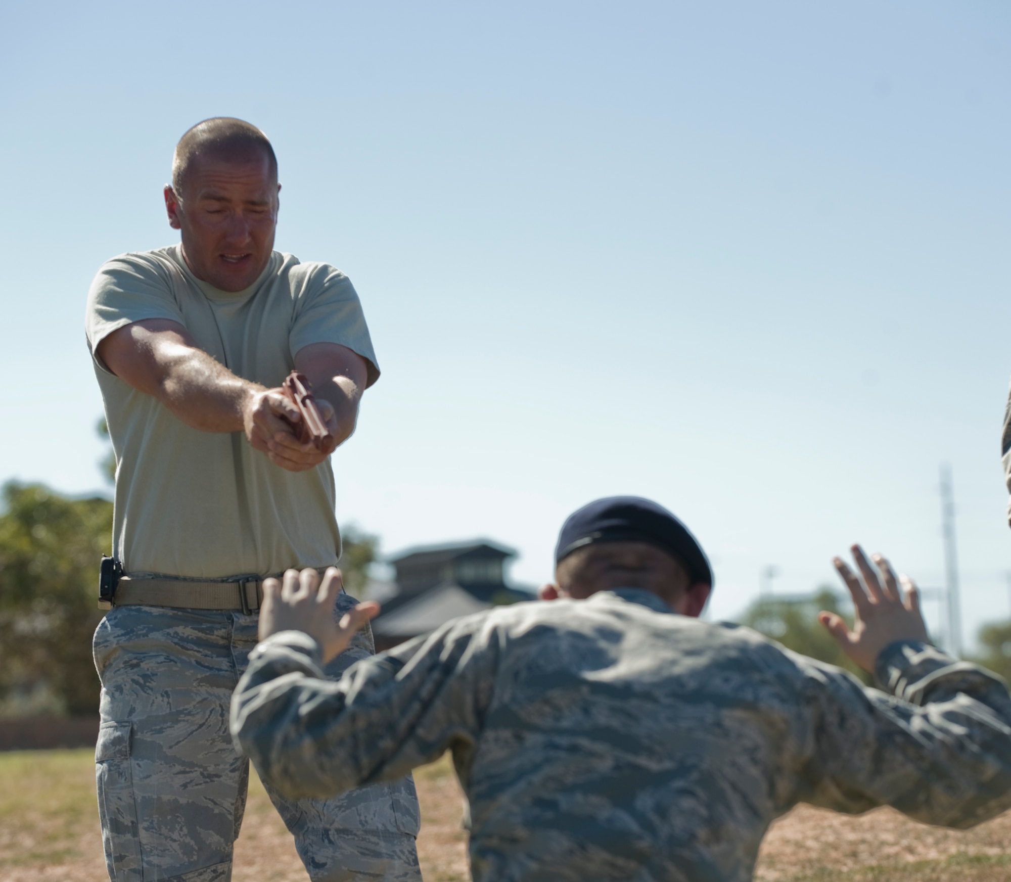 Staff Sgt. Sean Davis, 7th Security Forces Squadron, neutralizes a hostile suspect while under the effects of pepper spray during training Oct. 30, 2012, at Dyess Air Force Base, Texas. Training began with an hour-long class discussing the proper use of the Air Force’s new standard issued pepper spray. After the class, 7th SFS Airmen experienced the effects of the spray while running through a course. (U.S. Air Force photo by Airman 1st Class Jonathan Stefanko/ Released)