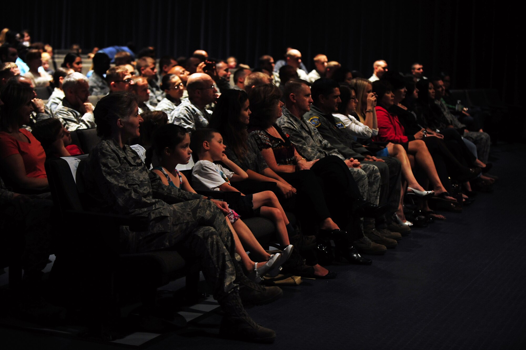 Members of Team Seymour attend a military working dog retirement ceremony on Seymour Johnson Air Force Base, N.C., Oct. 26, 2012. All members of Team Seymour were invited to attend the ceremony in honor of Frisco, Carlos and Ralph, 4th Security Forces Squadron MWDs. (U.S. Air Force photo/Airman 1st Class Aubrey White/Released)