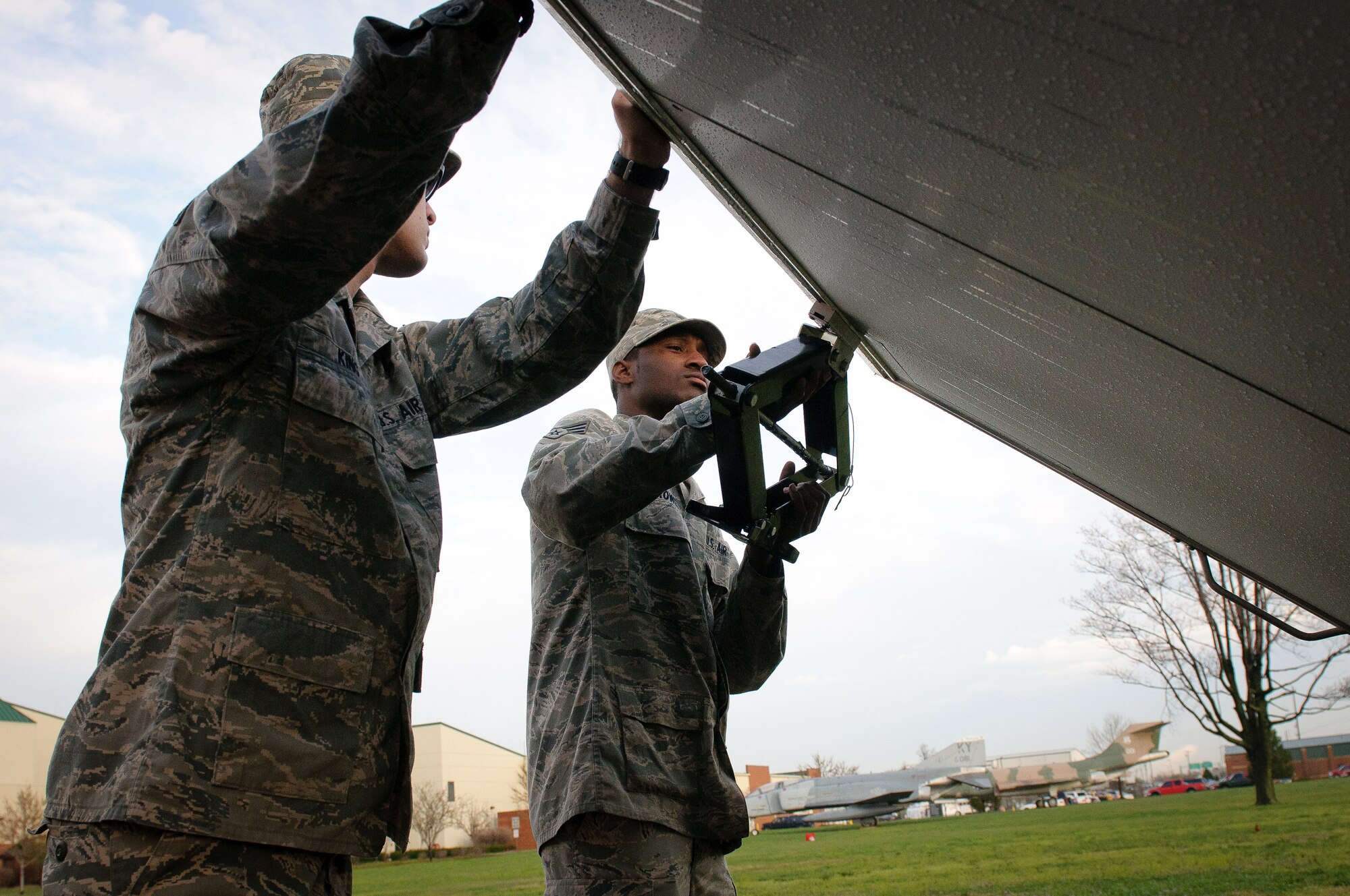 Airmen from the 123rd Force Support Squadron set up a new mobile field kitchen at the Kentucky Air National Guard Base in Louisville, Ky., on March 16, 2012. The kitchen can be deployed to the site of a natural disaster to provide hot meals for relief workers. (U.S. Air Force photo by Senior Airman Maxwell Rechel)