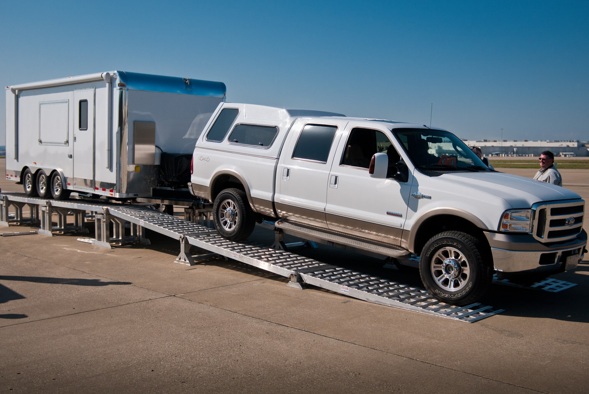 Airmen from the 123rd Airlift Wing evaluate a new mobile field kitchen at the Kentucky Air National Guard Base in Louisville, Ky., on March 14, 2012. The kitchen can be deployed to the site of a natural disaster to provide hot meals for relief workers. (U.S. Air Force photo by Master Sgt. Phil Speck)