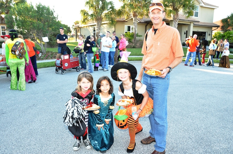 Lt. Col. Edward Black, 45th Director of Staff, enjoys the fall festivies with friends and family at Reef Court.