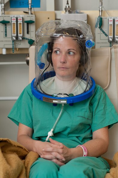 Patient Heather Leath prepares for another dive in the hyperbaric chamber at David Grant Medical Center. (U.S. Air Force Photo/Ken Wright)