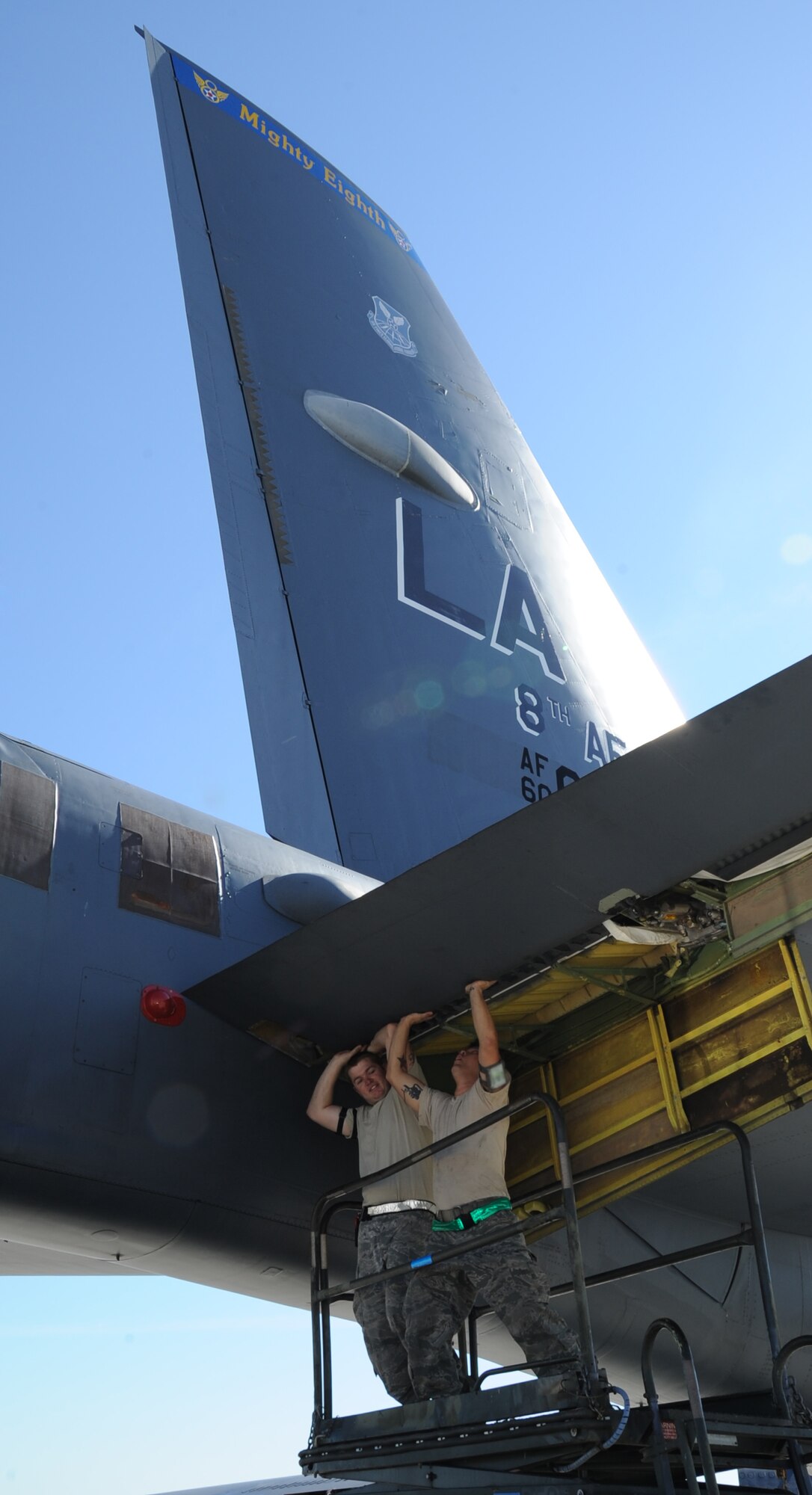 Senior Airmen Ernest Graff, left, and Timothy Hodge, both 2nd Maintenance Squadron repair reclamation journeymen, hold up an elevator flap on a B-52H Stratofortress on Barksdale Air Force Base, La., Nov. 2. The elevator flap controls the pitch of the B-52 during flight. The bomber is capable of flying at high subsonic speeds at altitudes up to 50,000 feet. (U.S. Air Force photo/Senior Airman Sean Martin)(RELEASED)