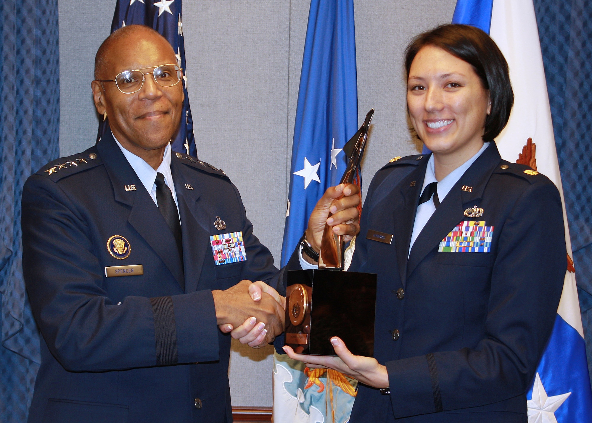 Air Force Vice Chief of Staff Gen. Larry Spencer presents the Gen. Lew Allen Jr. Award to Maj. Jennifer Gurganus during a ceremony in the Pentagon on Oct. 31, 2012. (U.S. Air Force photo/Steve Boley)