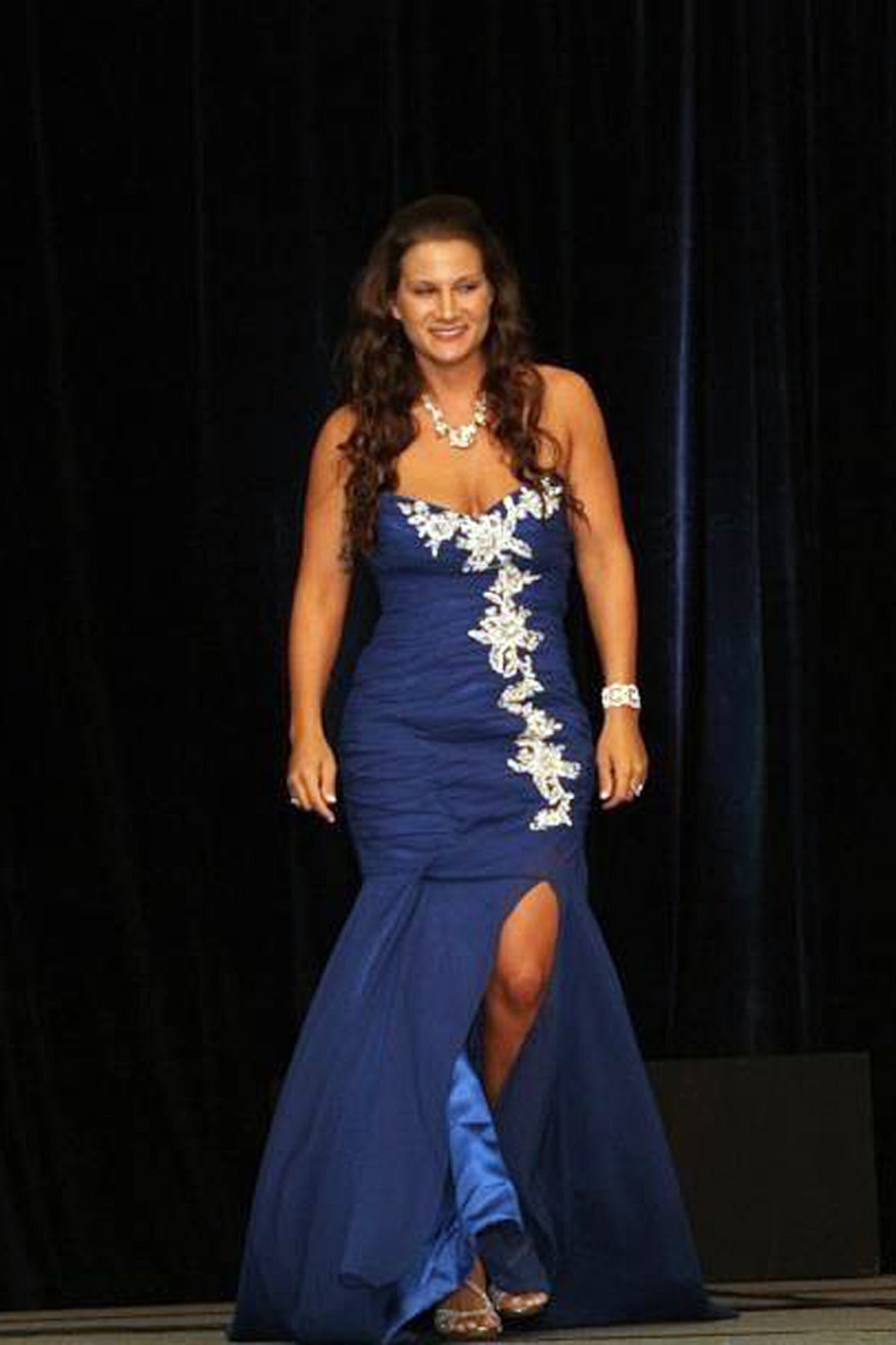Staff Sgt. Kimberly Miller walks onto the stage at the Ms. Veteran America competition in Arlington, Va., Oct. 7, 2012. Miller is a military training instructor at Joint Base San Antonio-Lackland, Texas, and competed in the first pageant for women in uniform. (Courtesy photo)