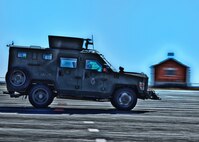 Staff Sgt. James Hodge, 90th Missile Security Forces Squadron, demonstrates proper stopping technique in a Bearcat on normal road conditions Oct. 30 on F. E. Warren's skid pad. This demonstration and others are intended to be used in a safety training video. (U.S. Air Force photo by Matt Bilden)