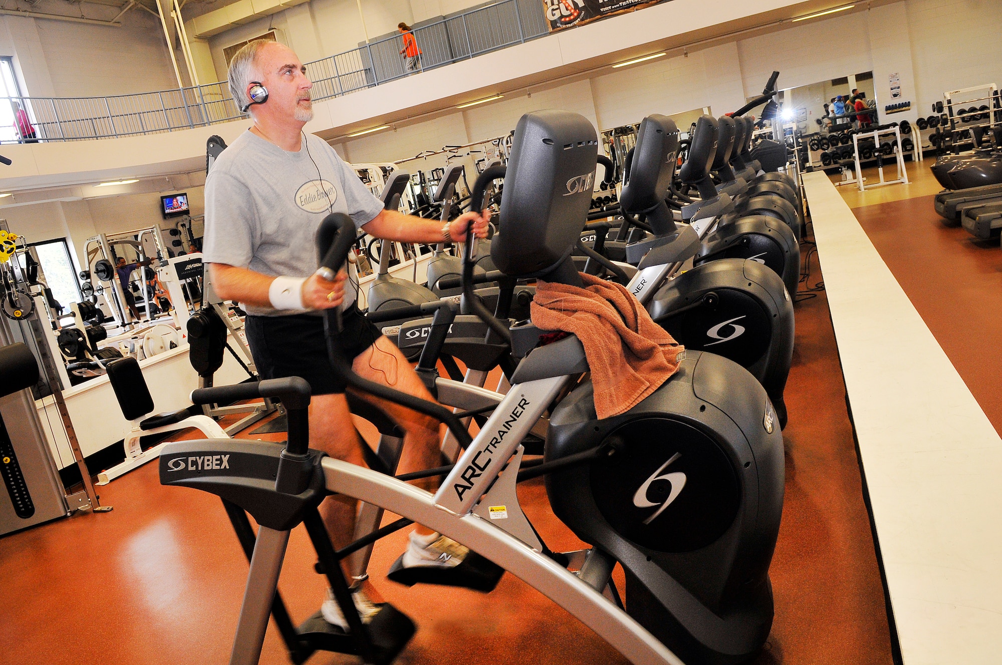 Kurt Northrup works out on one of the new Cybex ARC trainers at the Fitness Center. (U. S. Air Force photo/Sue Sapp)