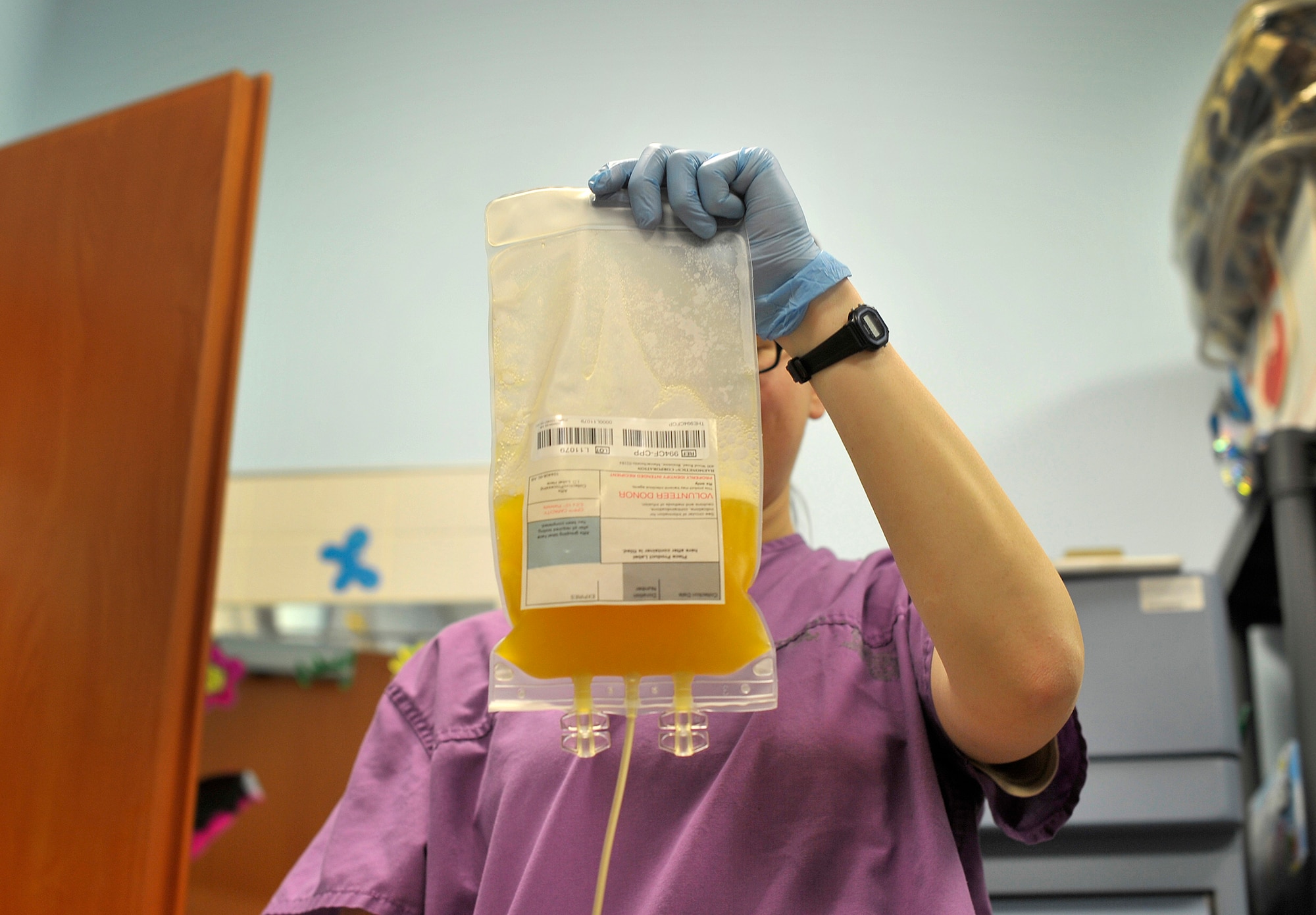 A U.S. Air Force member prepares a platelets donation for storage at the NATO Role 3 Hospital at Kandahar Airfield, Afghanistan, Oct. 25, 2012. Blood platelets are donated here at the Role 3 hospital in order to help trauma patients who are injured in combat. The apheresis section is managed by a U.S. Air Force five-member team that collects platelets from repeat donors, which in turn is used to help promote blood clotting in trauma patients at the Role 3 hospital and 14 Forward Operating Bases throughout Afghanistan. (U.S. Air Force photo/Staff Sgt. Clay Lancaster)