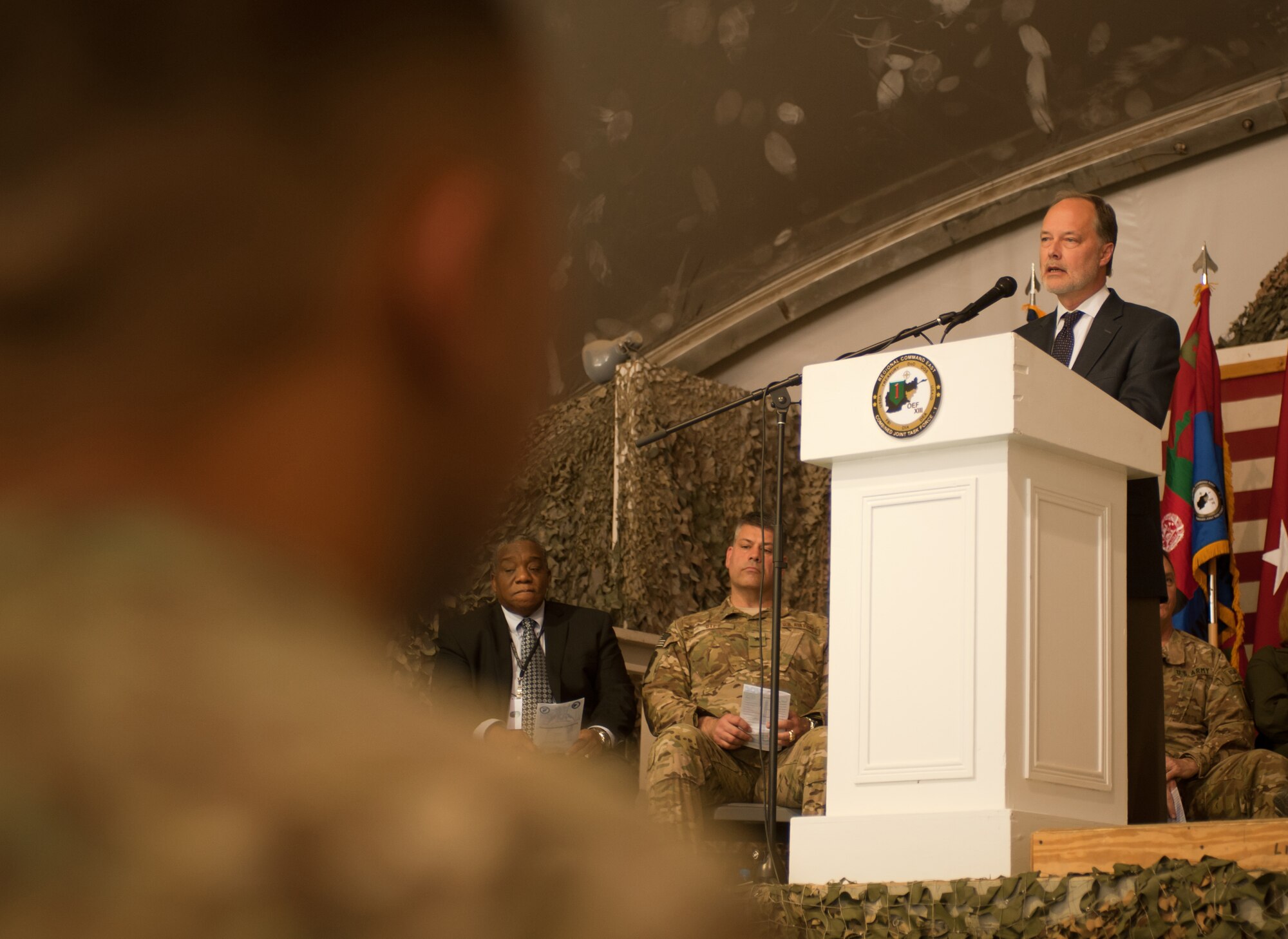 The Honorable James Cunningham, U.S. Ambassador to Afghanistan, addresses servicemembers about to take the oath of U.S. citizenship during a naturalization ceremony at Bagram Airfield, Afghanistan, Nov. 2, 2012. Cunningham thanked servicemembers for their service. 31 members of the U.S. Armed Forces took the oath, to include, Army, Air Force, and Marines. (U.S. Air Force photo/Staff Sgt. Jeff Nevison)
