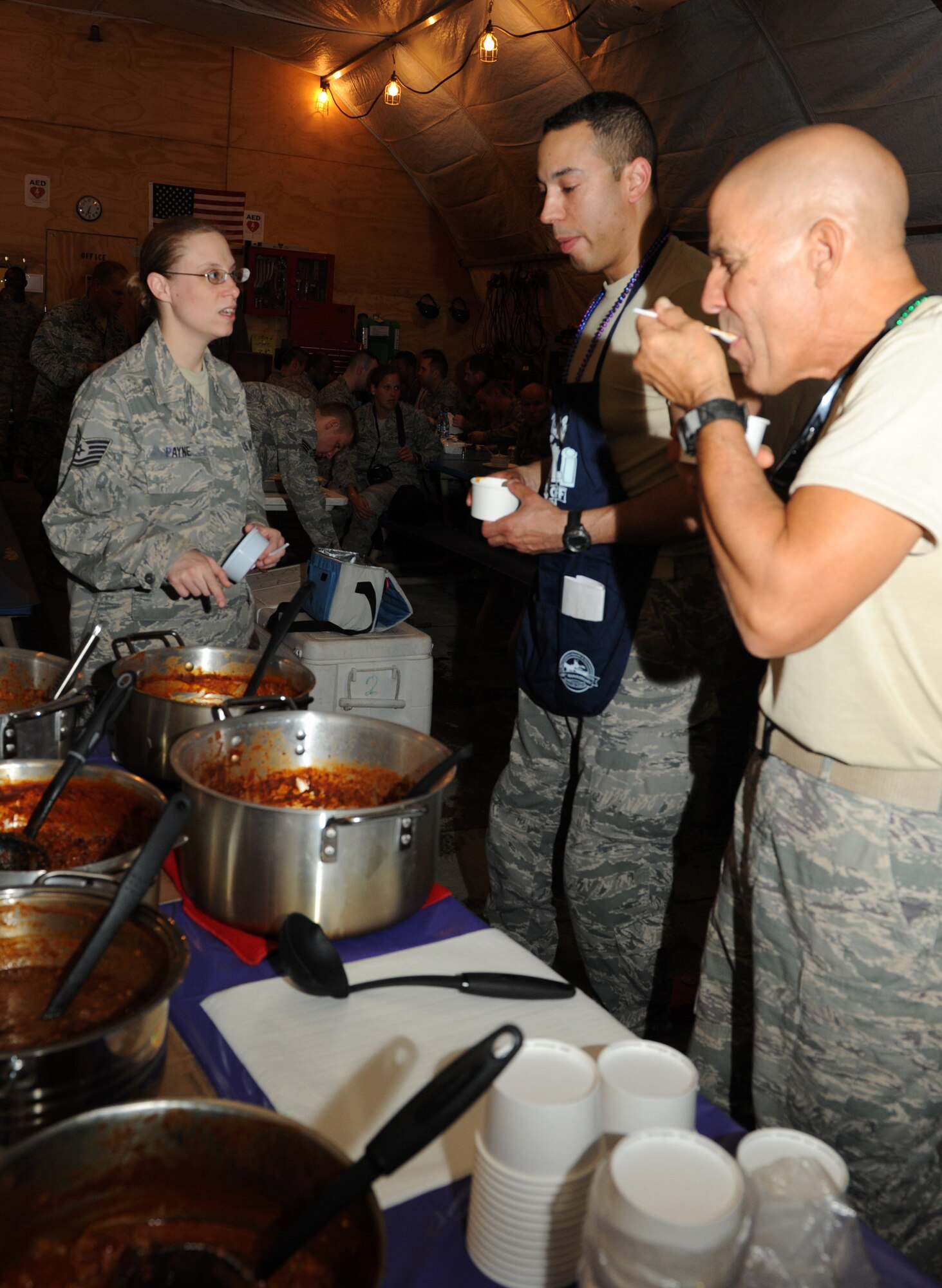 SOUTHWEST ASIA - U.S. Air Force Airmen deployed to the 380th Air Expeditionary Wing participate in the Kingpin Chili Cook Off here Oct. 30, 2012. The event was the first International Chili Society-sanctioned event overseas. (U.S. Air Force photo/Master Sgt. Scott MacKay)
