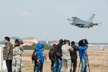Members of South Korean and other foreign media document Max Thunder 12-2 Media Day at Kunsan Air Base, Republic of Korea, Oct. 31, 2012. This exercise helped train the U.S. and Republic of Korea air force pilots and highlighted their capabilities to the media. (U.S. Air Force photo/Senior Airman Marcus Morris)