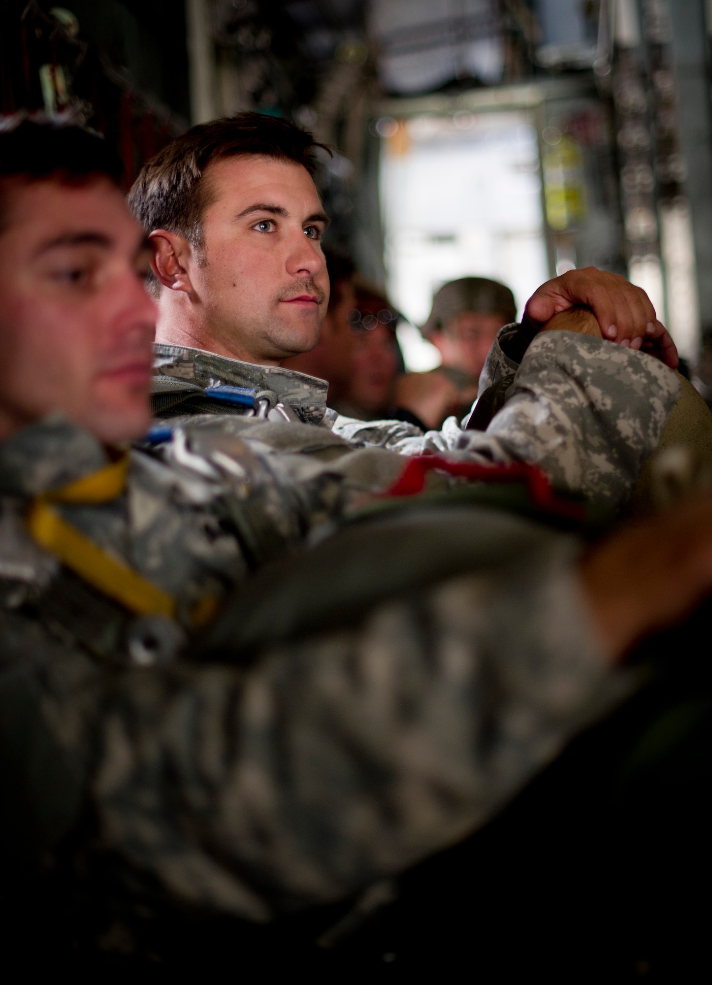 YOKOTA AIR BASE, Japan -- Army Airborne soldiers from Okinawa, Japan, wait for takeoff from Yokota Air Base in a C-130 Hercules Oct. 30, 2012. Airmen from the 374th Aircraft Maintenance Squadron at Yokota Air Base, Japan worked day and night to maintain the aircraft to support the soldiers training requirements. Getting the soldiers into the air took the combined efforts of the 374th Aircraft Maintenance Squadron, 36th Airlift Squadron and several other wing agencies that support flying operations. (U.S. Air Force photo by Staff Sgt. Stacy Moless)