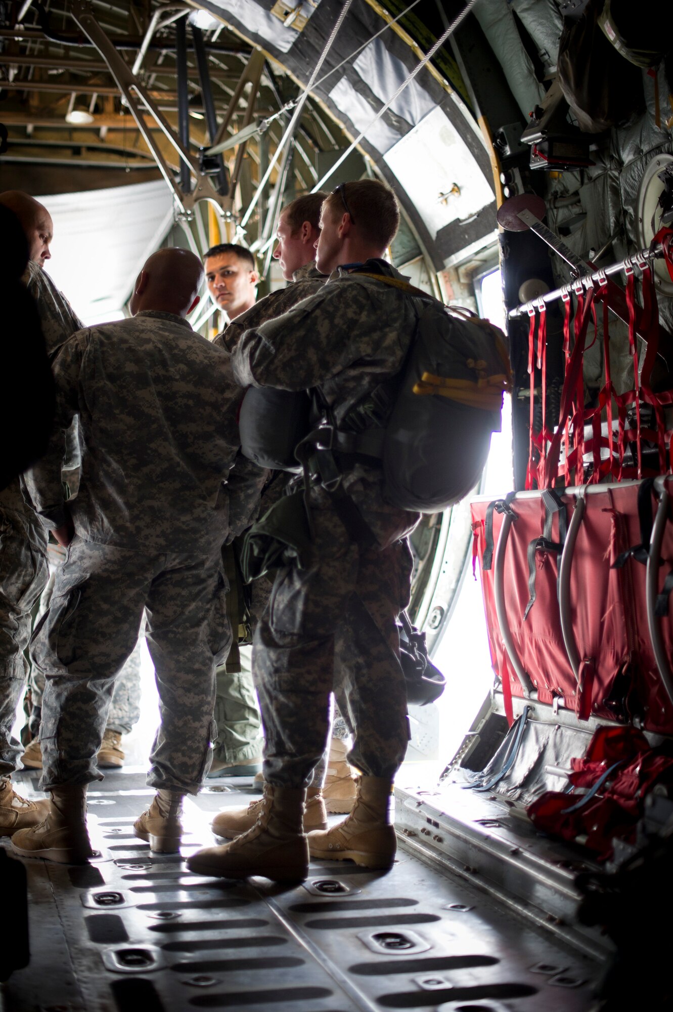 YOKOTA AIR BASE, Japan -- Army Airborne soldiers from Okinawa, Japan are given a pre-flight brief by aircrew with the 36th Airlift Squadron Oct. 30, 2012, at Yokota Air Base, Japan. The 36 AS and the 374th Aircraft Maintenance Squadron support the solders by supplying aircrew, maintainers and aircraft for their parachute training. (U.S. Air Force photo by Staff Sgt. Stacy Moless) 