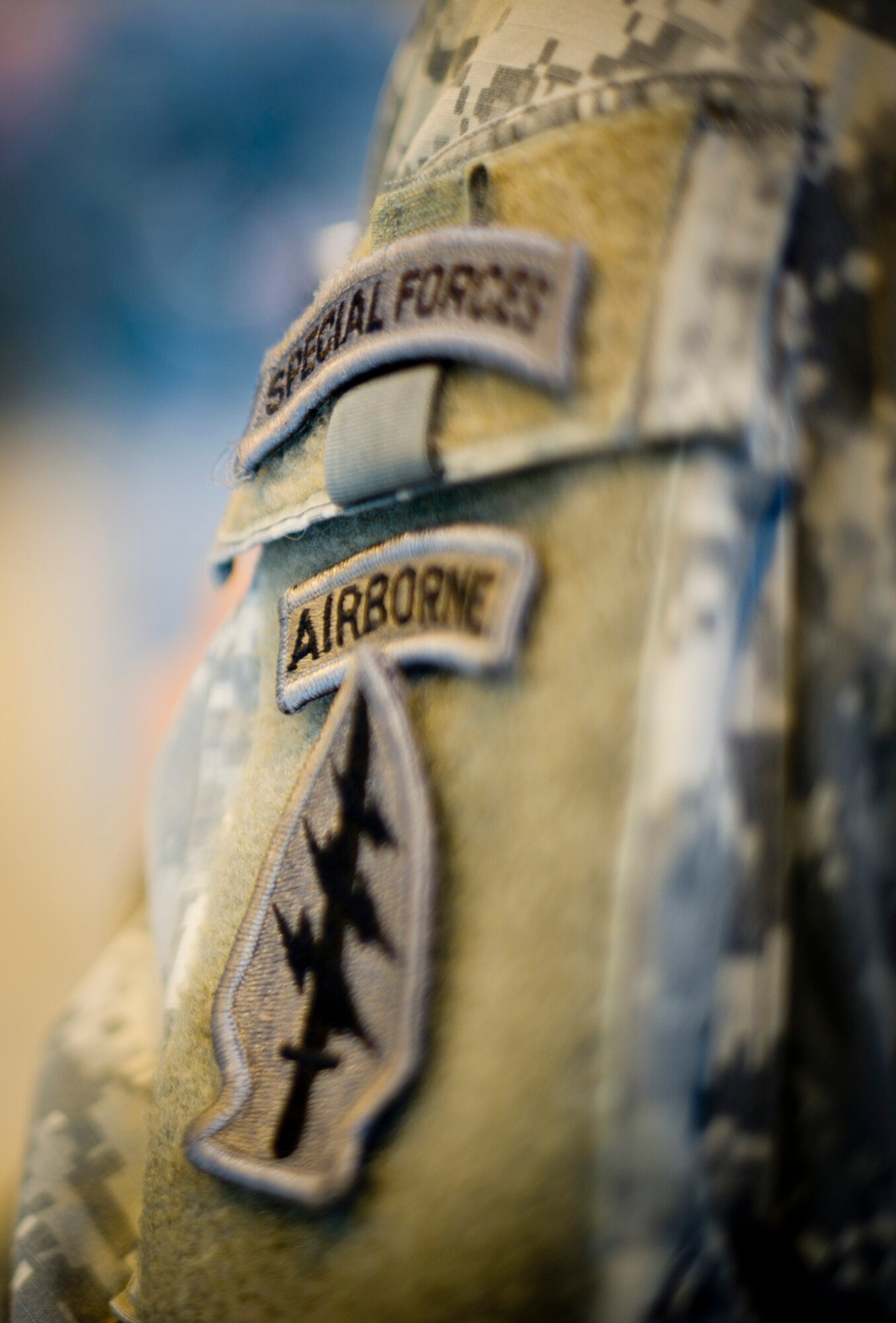 YOKOTA AIR BASE, Japan -- Special Forces and Airborne patches adorn the uniform of an Army Airborne soldier from Okinawa, Japan, visiting Yokota Air Base, Japan, Oct. 30, 2012. During the five days of training, due every 90 days, they practiced static line jumps as well as high-altitude, low-opening jumps. (U.S. Air Force photo by Staff Sgt. Stacy Moless)