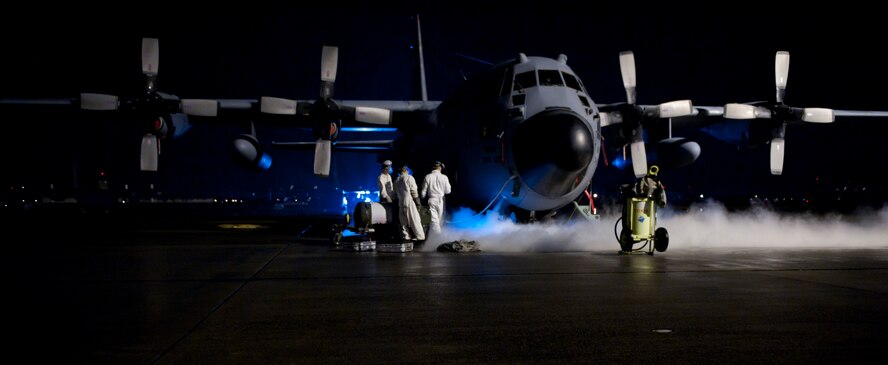 YOKOTA AIR BASE, Japan -- Crewchiefs from the 374th Aircraft Maintenance Squadron fill a C-130 Hercules's liquid oxygen tanks prior to a flight at Yokota Air Base, Japan, Oct. 29, 2012. Liquid oxygen is used in emergencies to create breathable air for the C-130's crew at high altitudes. (U.S. Air Force photo by Airman 1st Class Krystal M. Garrett) 