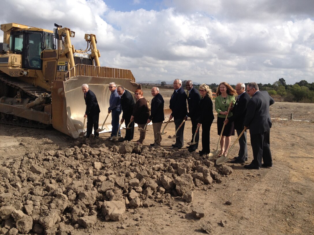 Los Angeles District’s Deputy Chief of Programs and Project Management Division Ken Morris (fifth from right) joined officials from the cities of Chino and Ontario, San Bernardino County, Inland Empire Utilities Agencies, Orange County Water District, California State Water Boards and the Santa Ana Watershed Project Authority for the groundbreaking of the Mill Creek Wetlands Project in Chino, Calif., Oct. 22. The wetlands project is an example of a public/private partnership working to develop a project with multiple regional benefits including; improved water quality in the Cucamonga Creek watershed, increased habitat within Prado Basin and enhanced recreational opportunities through the creation of about two miles of public use trails. Because the project is to be constructed in the Corps’ Prado Dam Flood Control Basin, the Corps team worked through a number of legal and policy issues to provide the proponents an outgrant for use of the property.