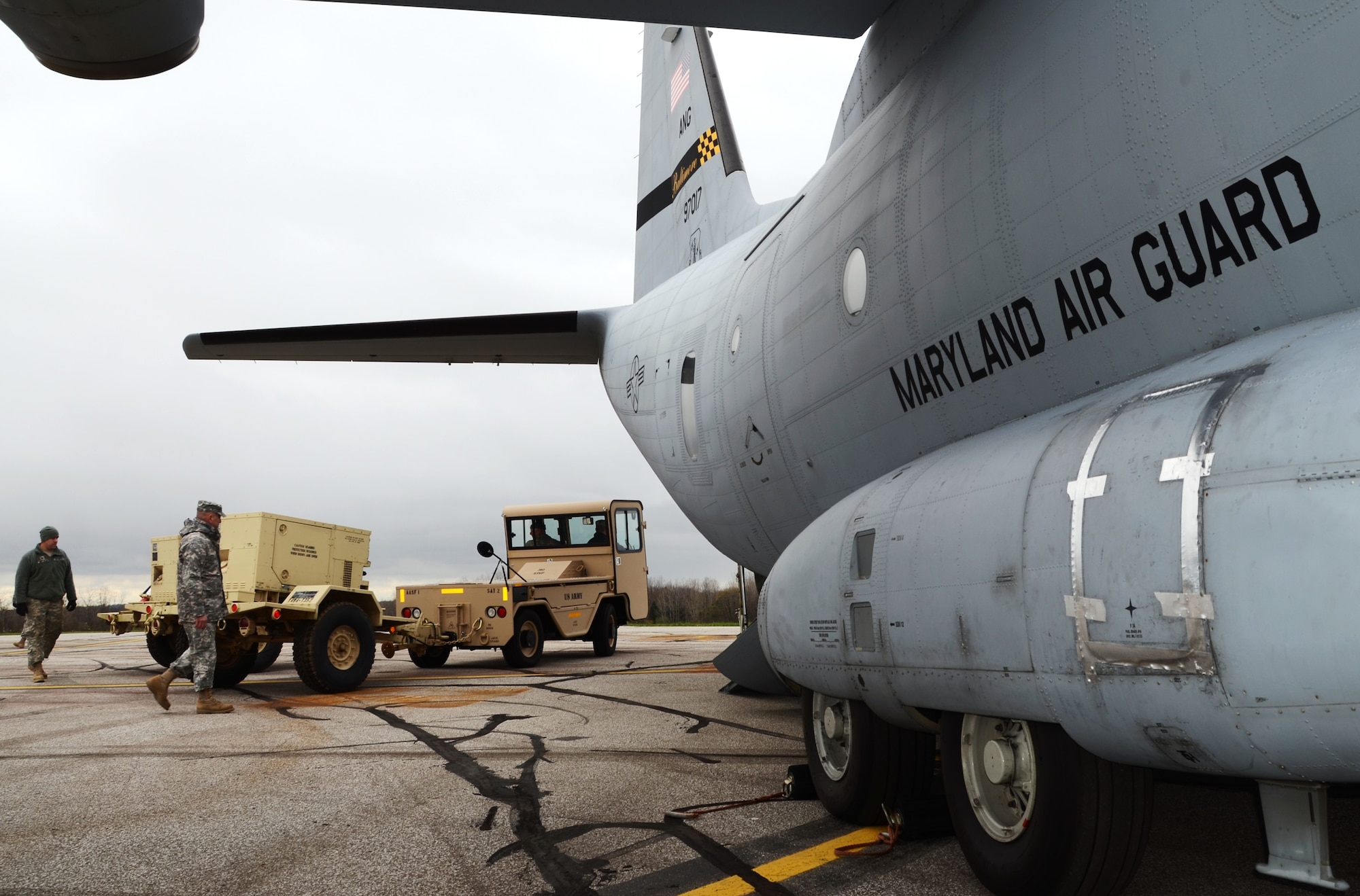 An electrical generator is towed to a waiting C-27J Spartan at the Akron-Canton Airport in Ohio on Saturday, November 3, 2012. The mission critical equipment is being transported by the Maryland Air National Guard for relief efforts in New York City due to Hurricane Sandy. (National Guard photo by Tech. Sgt. David Speicher)