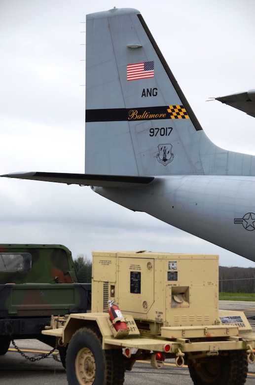 An electrical generator is towed to a waiting C-27J Spartan at the Akron-Canton Airport in Ohio on Saturday, November 3, 2012. The mission critical equipment is being transported by the Maryland Air National Guard for relief efforts in New York City due to Hurricane Sandy. (National Guard photo by Tech. Sgt. David Speicher)