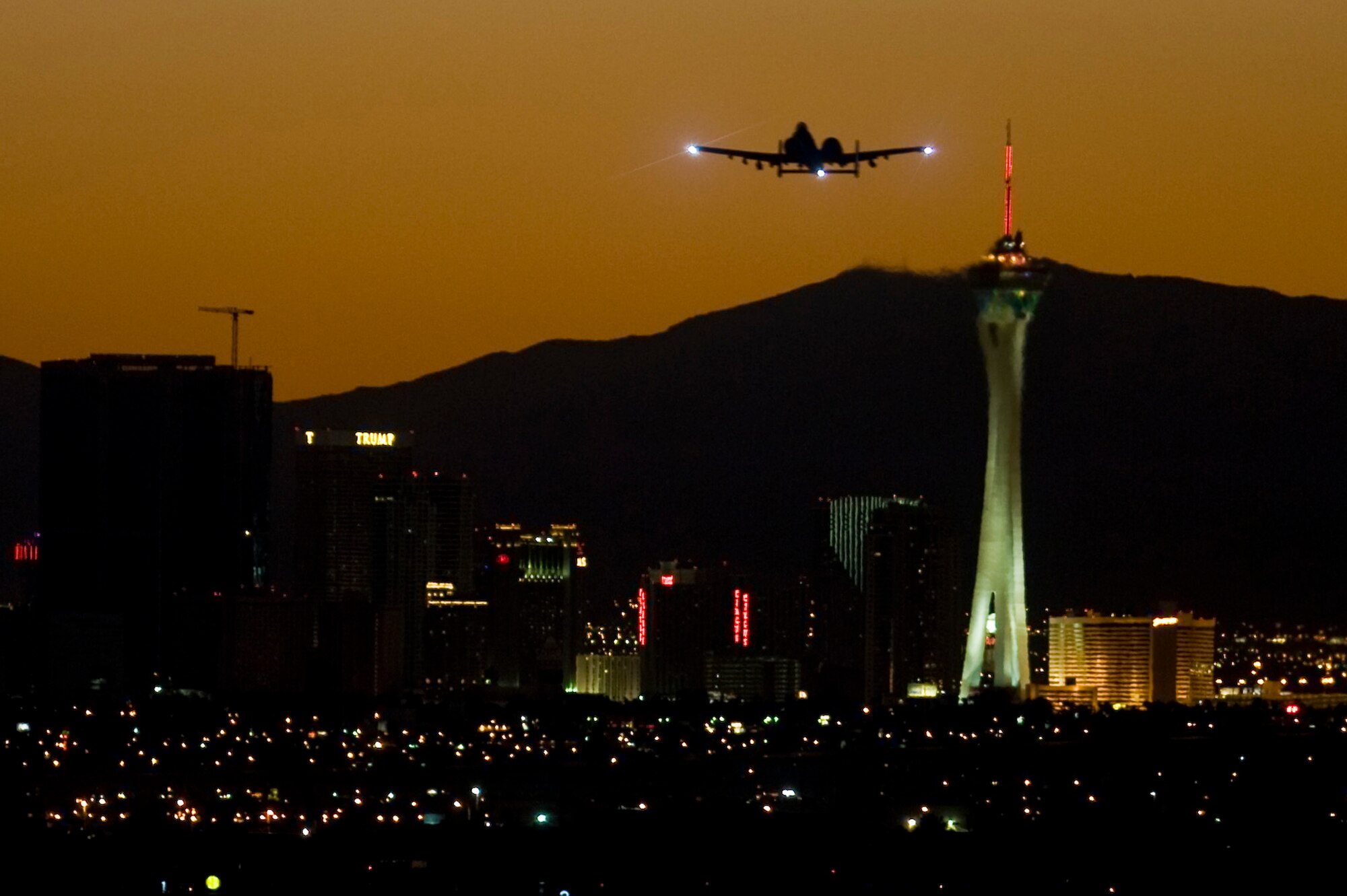 An A-10 Thunderbolt takes off over the Las Vegas Skyline during Green Flag-West Oct. 30, 2012, at Nellis Air Force Base, Nev.  Green Flag-West provides a realistic close-air support training environment for Airmen and soldiers preparing to deploy in support of combat operations. (U.S. Air Force photo by Senior Airman Daniel Hughes)
