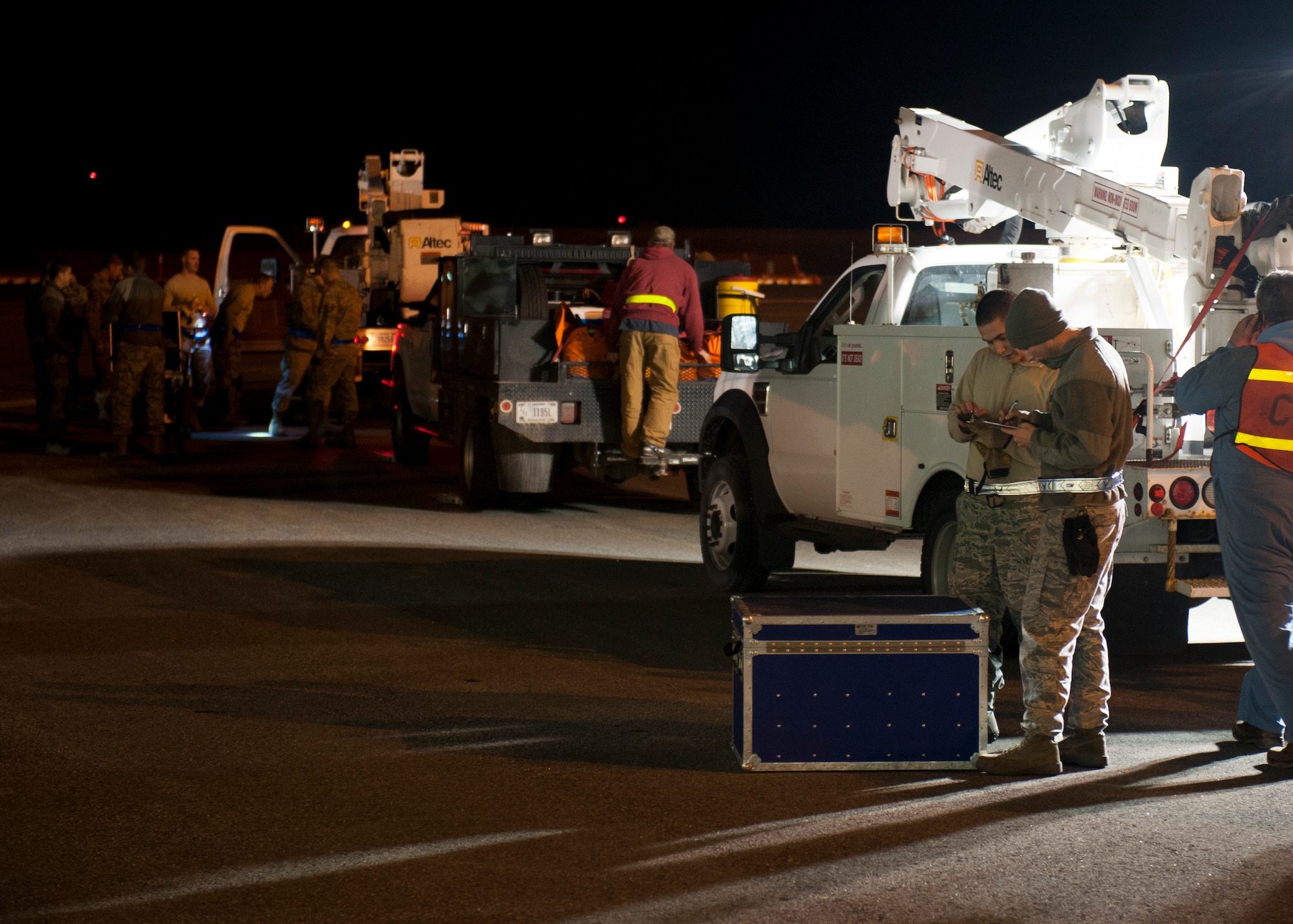 Airmen from the 92nd Logistics Readiness Squadron process equipment from the Spokane-area Bonneville Power Administration at Fairchild Air Force Base, Wash., Nov. 2, 2012. BPA sent 14 support and utilities vehicles as well as 19 BPA volunteer employees to aid New York's Long Island Power Authority in post Hurricane Sandy relief efforts. Five of the vehicles left on a C-5 Galaxy the morning of Nov. 3. The remaining vehicles are being transported by C-17 the same day. (U.S. Air Force photos by Staff Sgt. Michael Means)