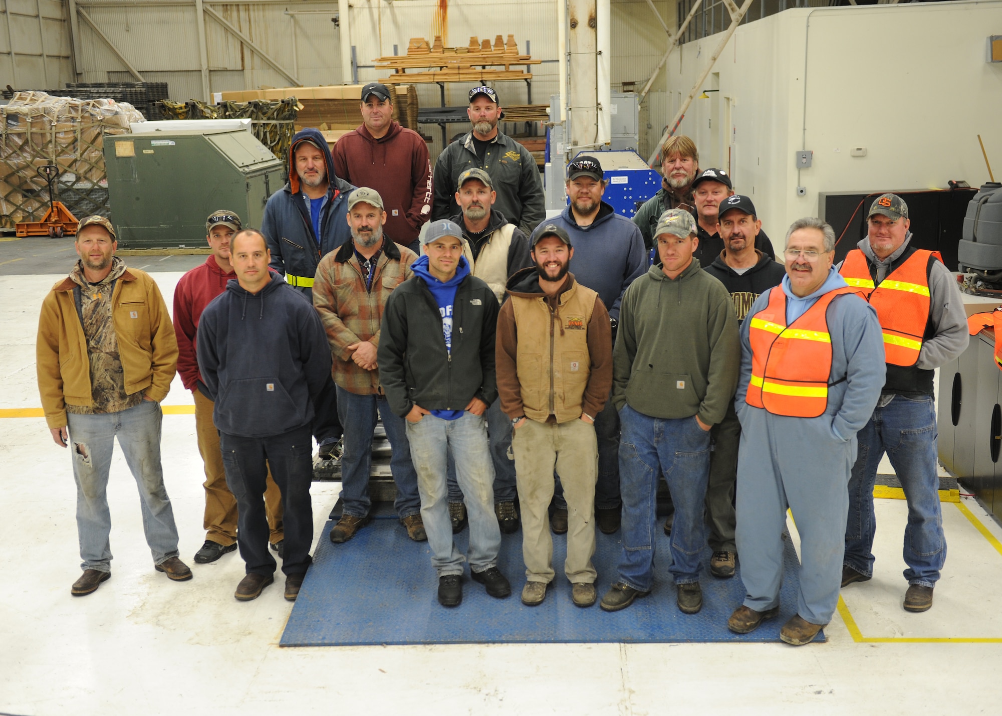 Volunteer employees from Bonneville Power Administration pose for a group photo at Fairchild Air Force Base, Wash., Nov. 2, 2012. Nineteen BPA members left Fairchild on a C-5 Galaxy from Travis Air Force Base, Calif., at about 11 a.m. Nov. 3 for Joint Base McGuire Dix Lakehurst, N.J. Their final destination will be Long Island, N.Y. (U.S. Air Force photos by Staff Sgt. Michael Means)