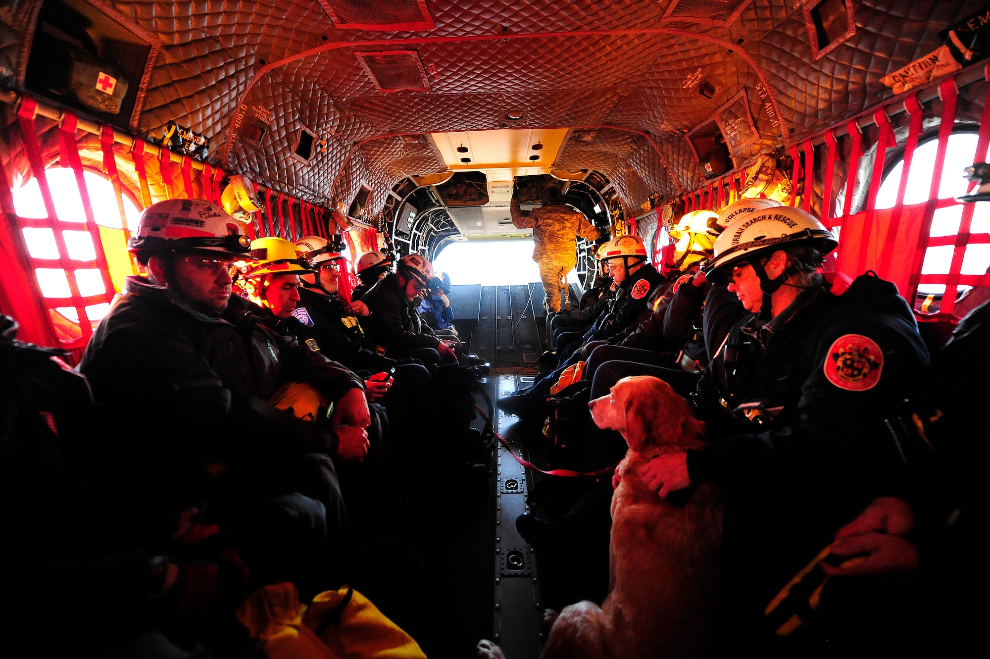 JOINT BASE MCGUIRE-DIX-LAKEHURST, N.J. – Members of Maryland Urban Search and Rescue Task Force one fly aboard a U.S. Army CH-47 helicopter assigned to the Georgia Army National Guard from Joint Base McGuire-Dix-Lakehurst, N.J. to Staten Island, N.Y. to conduct house-to-house searches, Nov 3, 2012.  Maryland Task Force one is part of the National Search and Rescue Task Force recovery effort in the aftermath of hurricane Sandy.  (U.S. Air Force photo by Tech. Sgt. Parker Gyokeres/Released)