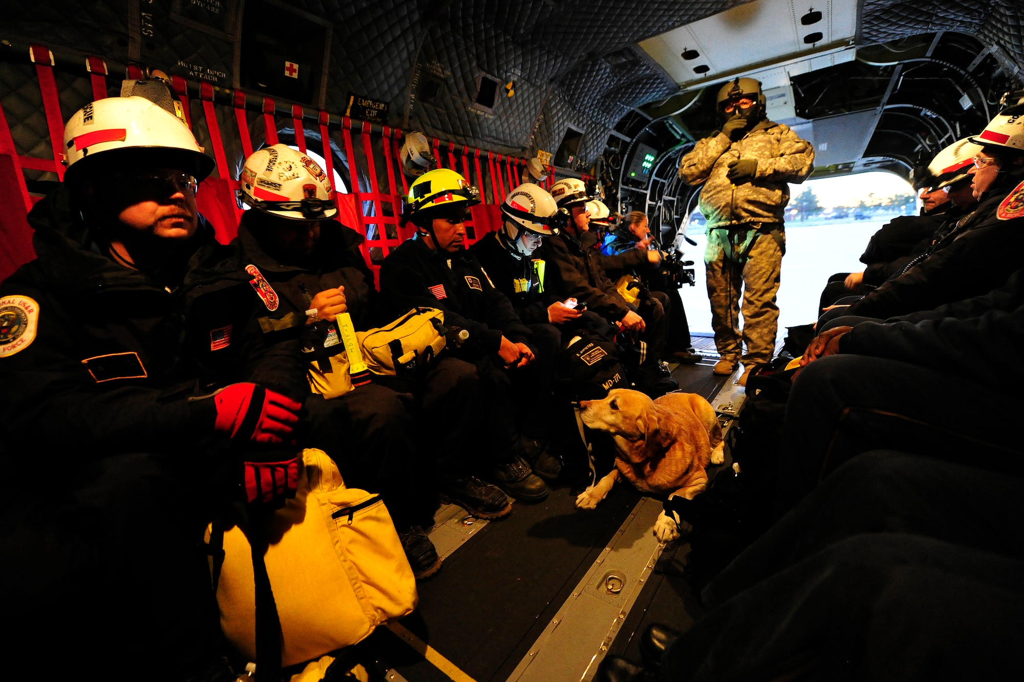 JOINT BASE MCGUIRE-DIX-LAKEHURST, N.J. – Members of Maryland Urban Search and Rescue Task Force one fly aboard a U.S. Army CH-47 helicopter assigned to the Georgia Army National Guard from Joint Base McGuire-Dix-Lakehurst, N.J. to Staten Island, N.Y. to conduct house-to-house searches, Nov 3, 2012.  Maryland Task Force one is part of the National Search and Rescue Task Force recovery effort in the aftermath of hurricane Sandy.  (U.S. Air Force photo by Tech. Sgt. Parker Gyokeres/Released)