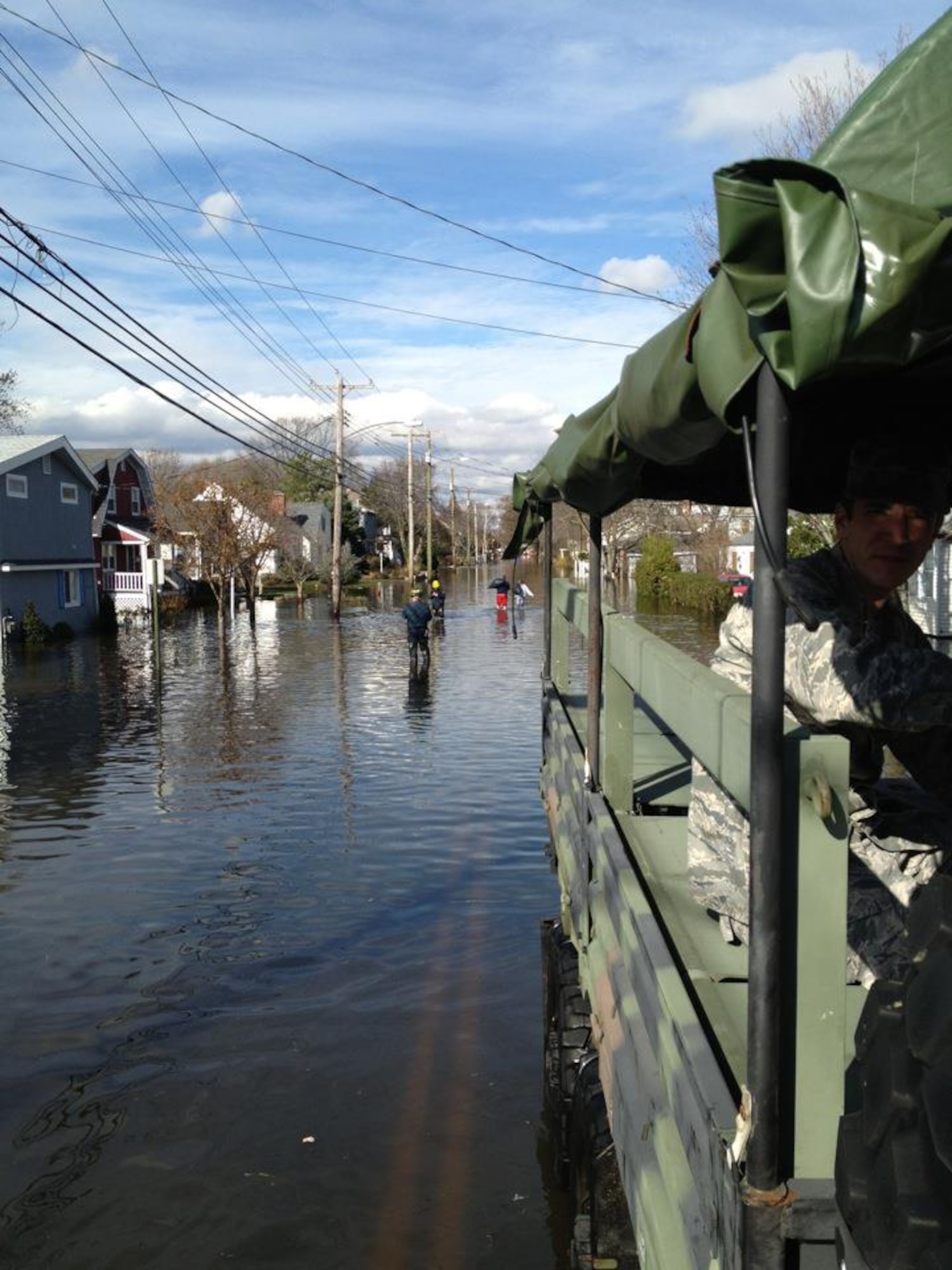 Flood waters can be seen in a Southern Connecticut town from one of the Orange-based 103rd Air Control Squadron’s high-wheeled vehicles that responded in the wake of Super Storm Sandy Nov. 1, 2012. (Photo courtesy of Maj. Joe Sorrentino)