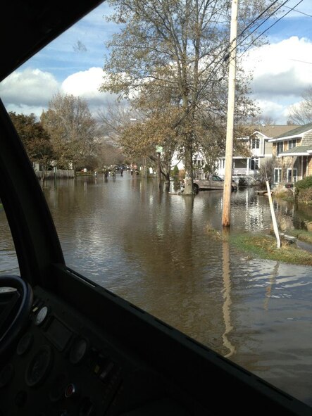 Flood waters can be seen in a Southern Connecticut town from one of the Orange-based 103rd Air Control Squadron’s high-wheeled vehicles that responded in the wake of Super Storm Sandy Nov. 1, 2012. (Photo courtesy of Maj. Joe Sorrentino)