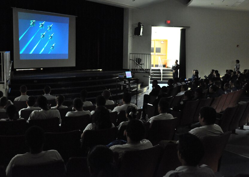 Air Force Junior ROTC students watch a video featuring the U.S. Air Force Thunderbirds at Homestead Senior High School, Nov. 2. Members of the Thunderbirds have visited several locations throughout South Florida during their time here prior to the Wings Over Homestead air show, Nov. 3 and 4. (U.S. Air Force photo/Ross Tweten)