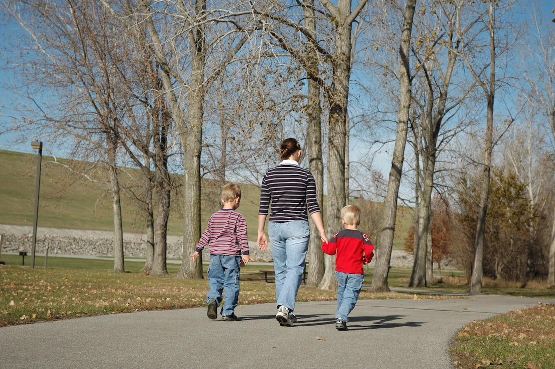 Family walking along trail