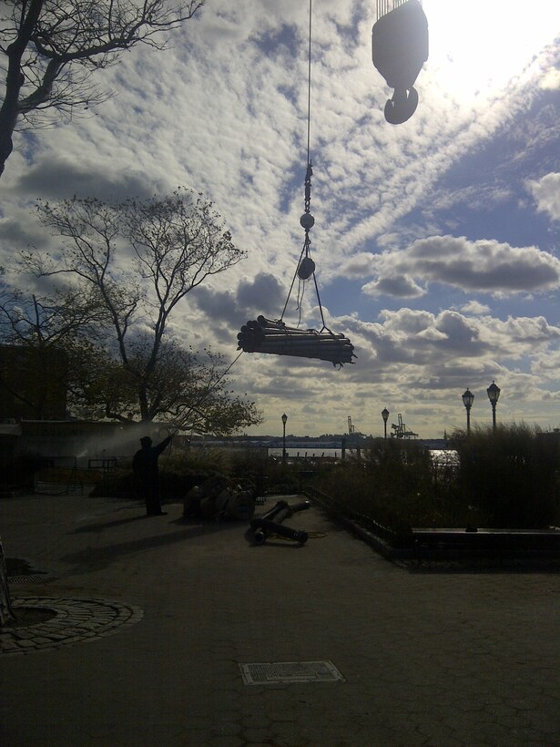 Pump supplies being offloaded from their marine vessel in support of Hurricane Sandy response efforts.