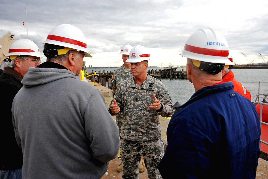 Army Major Gen. Kendall P. Cox, U.S. Army Corps of Engineers deputy commanding general for military and international operations, thanks his civillian workers for their efforts handling cleanup efforts after Hurricane Sandy caused extensive damage to the New York City region, Nov. 2, 2012.