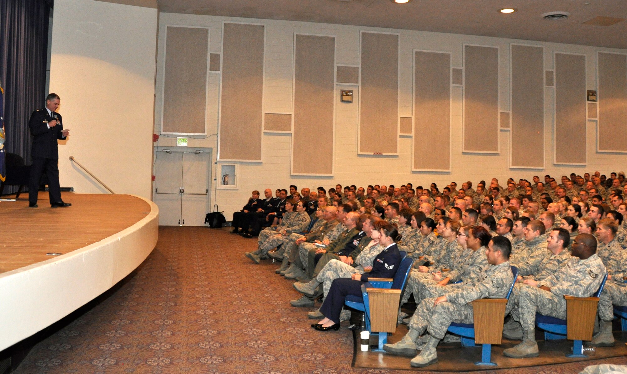 Air Force Reserve Col. Jay Pittman, 302nd Airlift Wing commander, addresses members of the wing Nov. 4 during a commander's call at Peterson Air Force Base, Colo. The colonel covered several issues, including recognizing recent medal recipients, award winners, Community College of the Air Force graduates and exceptional performers during the wing's recent Operational Readiness Inspection.  (U.S. Air Force photo/Staff Sgt. Stephen J. Collier)