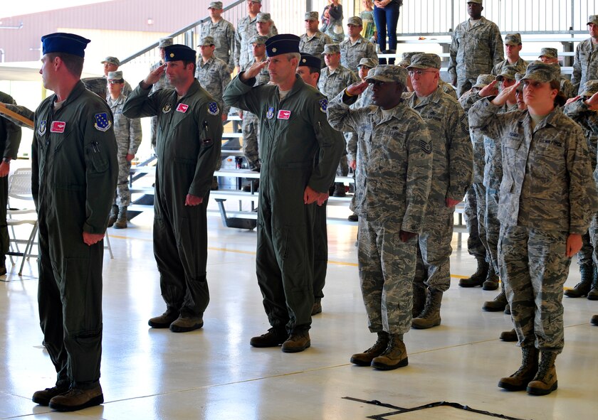 HOLLOMAN AIR FORCE BASE, N.M. -- Members of the 301st Fighter Squadron render the first salute to new commander, Lt. Col. Andrew Lyons, during an assumption of command ceremony here Nov. 3.  (U.S. Air Force photo by Senior Airman Martha Whipple/Released)