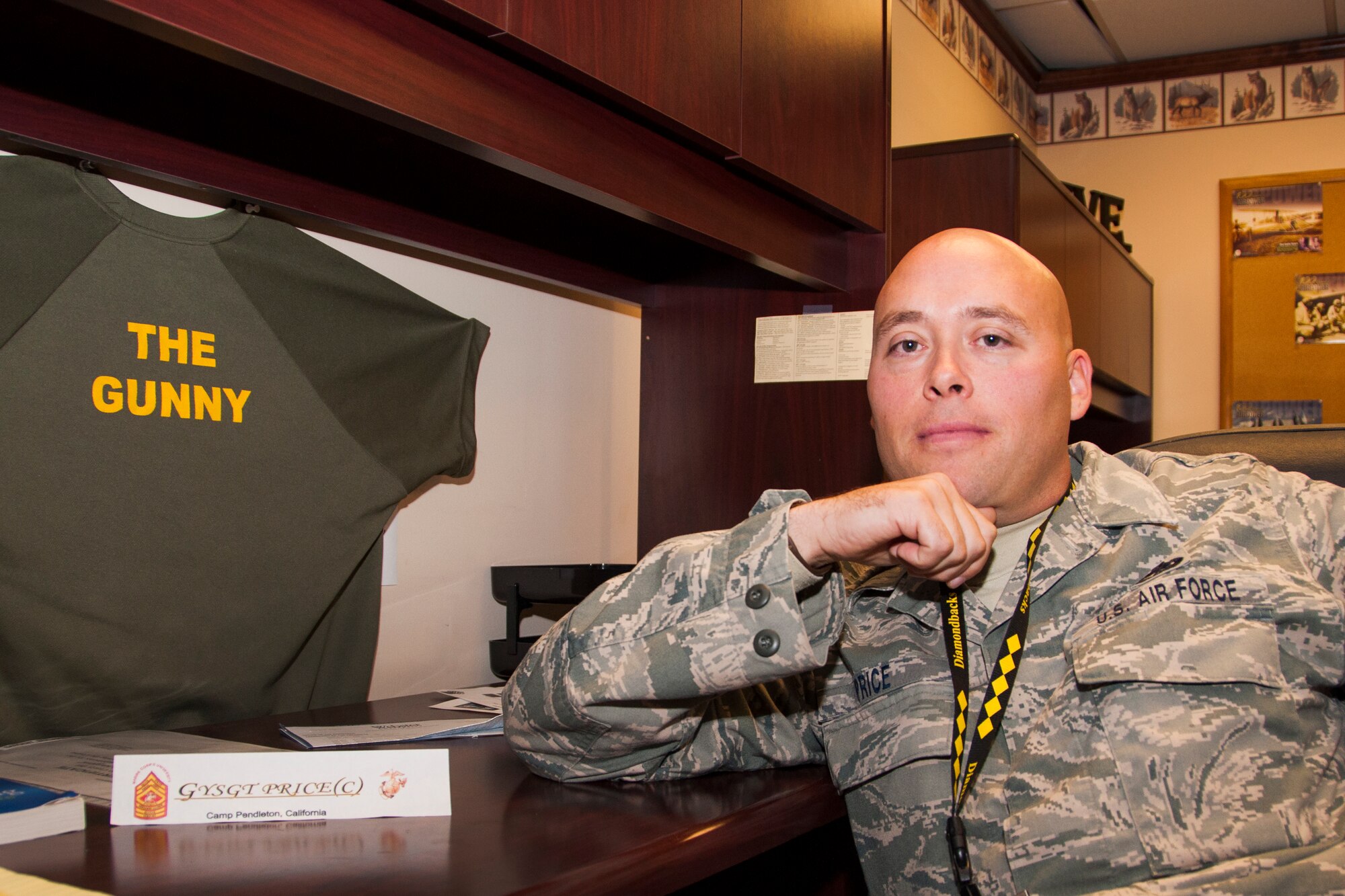 Senior Master Sgt. Noel Price, accessory flight chief in the 419th Maintenance Squadron, spent eight weeks at Camp Pendleton, Calif. to train with Marine NCOs. He received “The Gunny” shirt for showing extreme motivation while he was there. (U.S. Air Force photo/ Senior Airman Crystal Charriere)