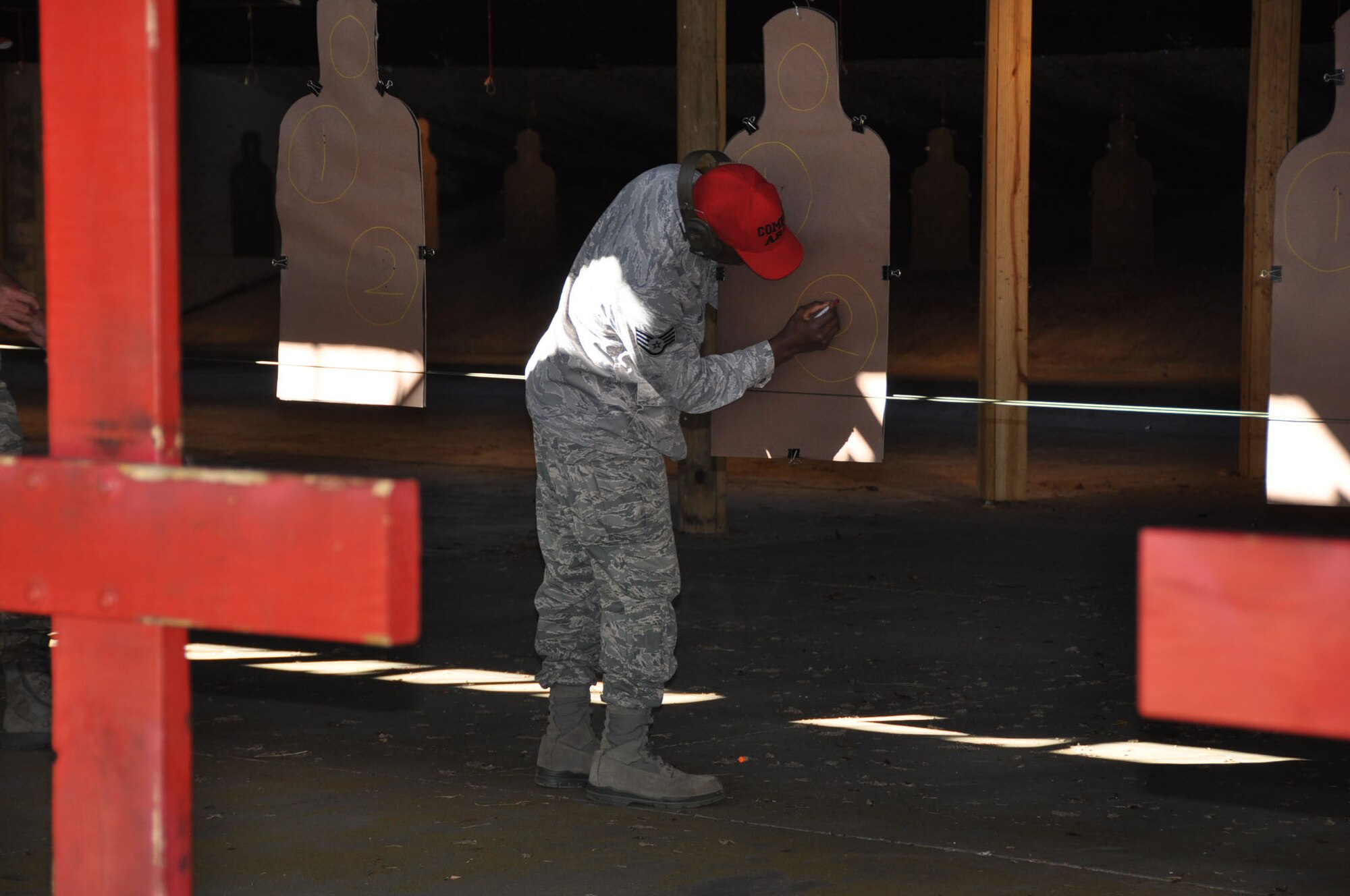 Members of the 315th Airlift Wing participate in the new Air Force M4 Rifle Carbine Qualification Course here Saturday Nov. 3, 2012. 

The Air Force has toughened its firearms training with a mandatory three-level training course that combines basic firing positions with advanced tactical movements.