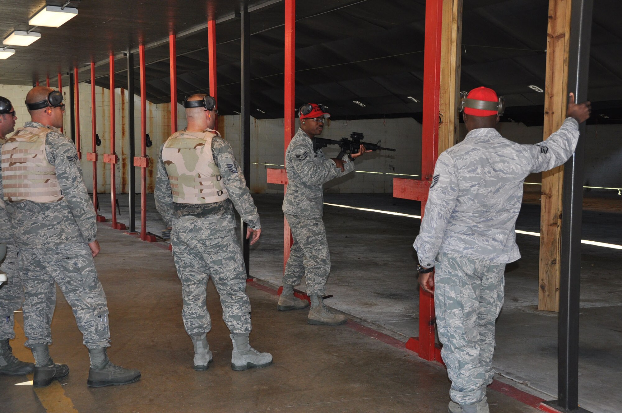 Members of the 315th Airlift Wing participate in the new Air Force M4 Rifle Carbine Qualification Course here Saturday Nov. 3, 2012. 

The Air Force has toughened its firearms training with a mandatory three-level training course that combines basic firing positions with advanced tactical movements.