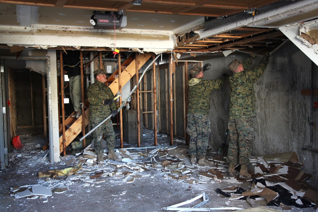 U.S. Marines assess damage in Staten Island, N.Y., Nov. 4, 2012, in response to Hurricane Sandy.