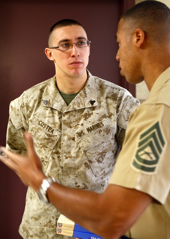 Cpl. Ryan Costea, a rifleman with Company D, Anti-Terrorism Battalion, 4th Marine Division, listens as Gunnery Patrick Foreman, a career planner, explains Costea’s available choices to him in Billings, Mont., October 20, 2012.  Company D, an infantry company, is being transformed into a military police company due to the commandant-directed Force Structure Review, which will affect 147 of 183 Marine Forces Reserve sites as the force restructures and modernizes its units.  The Marine Corps has assembled a Personnel Transition Team to help Marines make informed career choices as to how they can continue to serve in the Corps.
