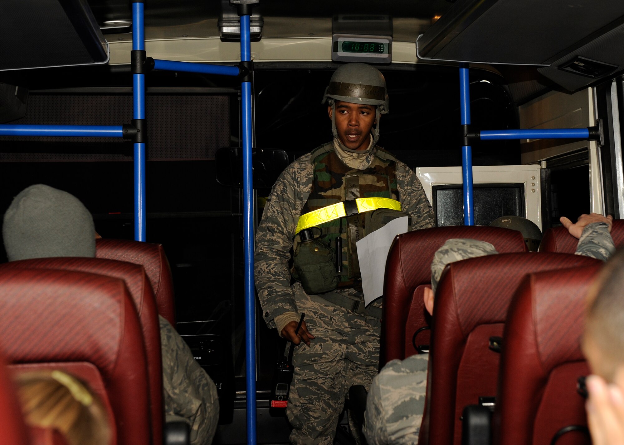 Staff Sgt. Sir Thomas, 8th Logistics Readiness Squadron, briefs “inbound” Airmen during Beverly Bulldog 13-1 on Kunsan Air Base, Republic of Korea, Nov. 5, 2012. After landing, the Airmen were put on a bus and sent to the Personnel Deployment and Readiness Function where they were in processed and briefed.  (U.S. Air Force photo/Senior Airman Marcus Morris)