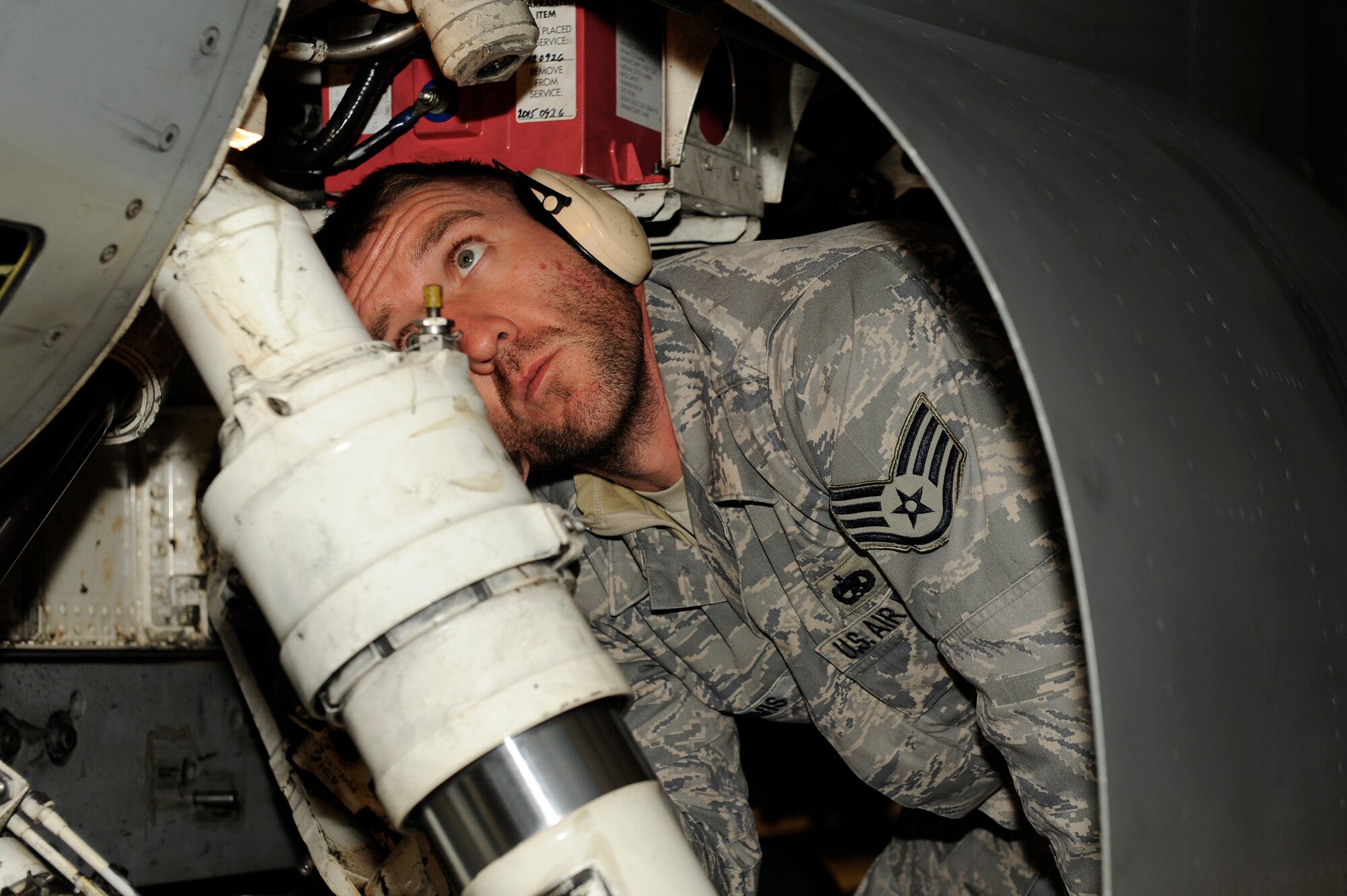 Staff Sgt. Michael Davis, 8th Aircraft Maintenance Squadron, goes over the interior of an F-16 Fighting Falcon for any problems before it is ready to fly during exercise Beverly Bulldog 13-11 at Kunsan Air Base, Republic of Korea, Nov. 4, 2012. The exercise helps maintenance train for real world missions. (U.S. Air Force photo/Senior Airman Marcus Morris)