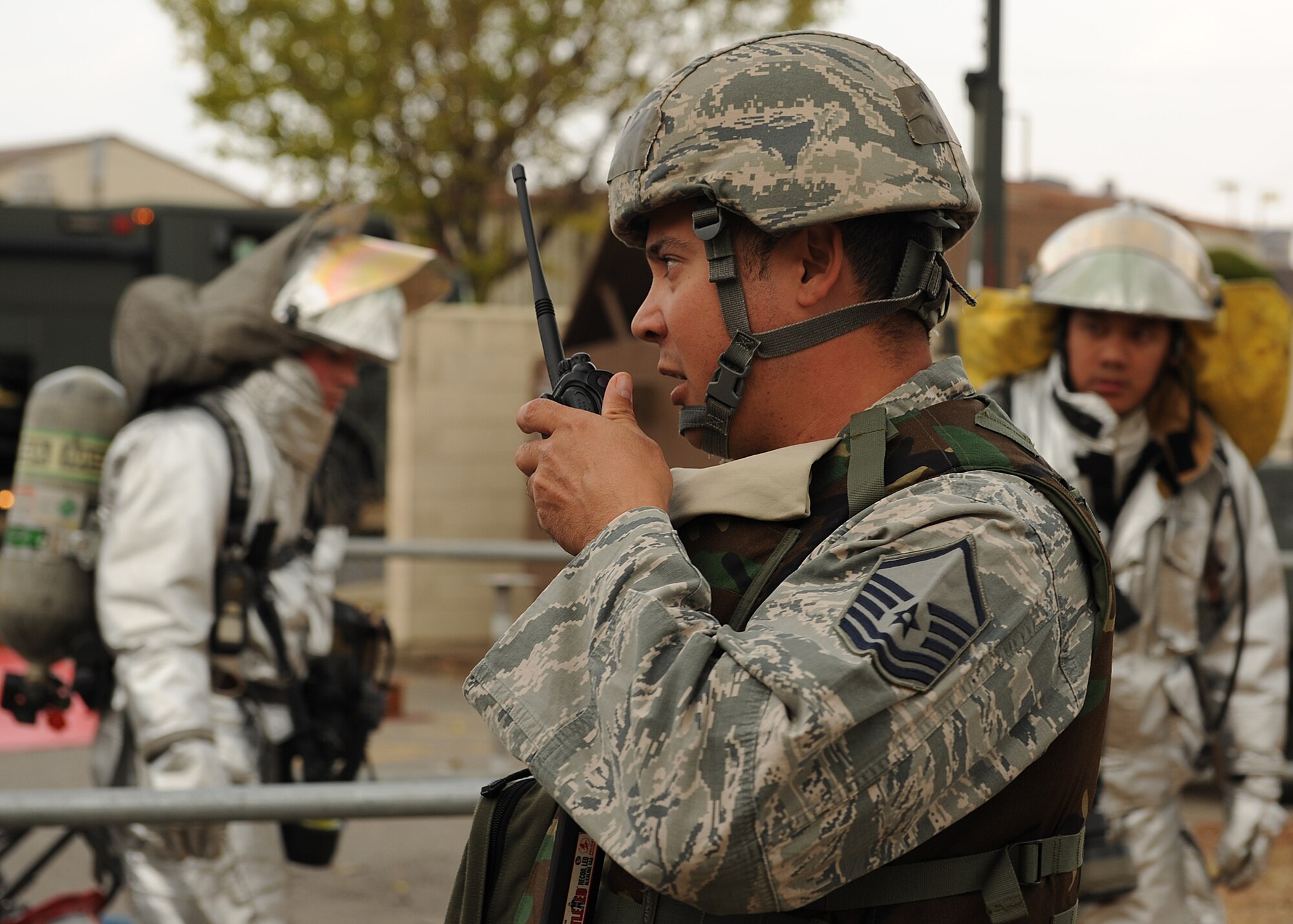 Master Sgt. Alphonso Leal, 8th Civil Engineer Squadron, calls in information during a simulated fire on Kunsan Air Base, Republic of Korea, Nov. 5, 2012. This was part of exercise Beverly Bulldog 13-1, which simulated various emergency and wartime scenarios base personnel might be called to respond to. (U.S. Air Force photo/Staff Sgt. Jonathan Fowler)