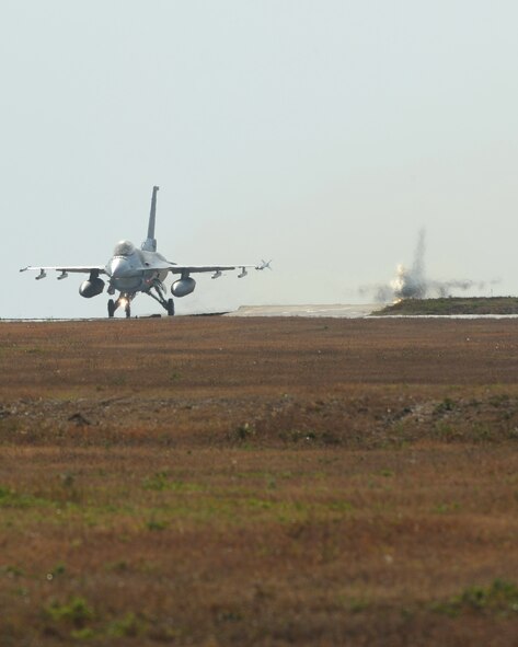 Two F-16 Fighting Falcons with the 38th Fighter Group prepare to take-off during Beverly Bulldog 13-1 on Kunsan Air Base, Republic of Korea, Nov. 5, 2012. The exercise is an assessment of U.S. and ROK air forces capabilities and combat readiness. (U.S. Air Force photo/Staff Sgt. Jonathan Fowler)