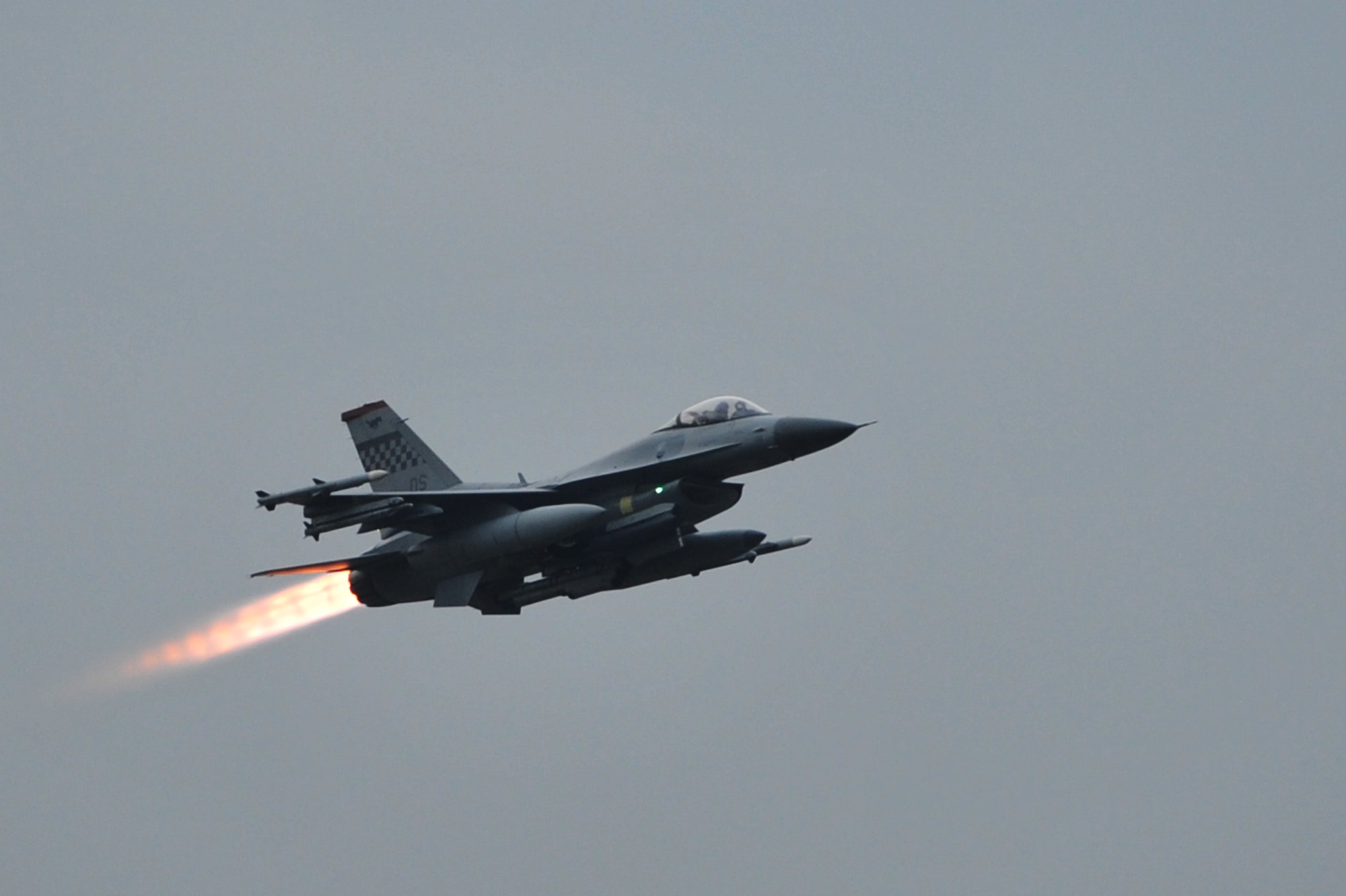 An F-16 Fighting Falcon launches during a combat sortie for operational readiness exercise Beverly Bulldog 13-01 from Osan Air Base, Republic of Korea, Nov. 6, 2012. The exercise tests Osan Airmen’s abilities during a heightened state of readiness while providing combat ready forces for close air support, air strike control, counter air, interdiction, theater airlift, and communications in the defense of the Republic of Korea. (U.S. Air Force photo/Staff Sgt. Craig Cisek)