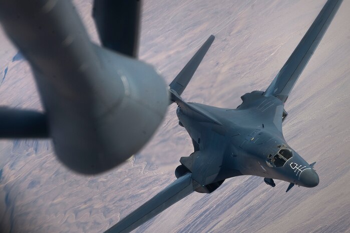 A B-1B Lancer, 28th Bomb Wing, Ellsworth Air Force Base, S.D., approaches a KC-135 Stratotanker, 350th Air Refueling Squadron, McConnell AFB, Kan., to be refueled during the Green Flag-West 13-2 exercise Nov. 4, 2012. A typical Green Flag exercise involves two multi-role fighter and/or bomber squadrons, unmanned aircraft, electronic warfare aircraft and aerial refueling aircraft. (U.S. Air Force photo by Staff Sgt. Christopher Hubenthal)